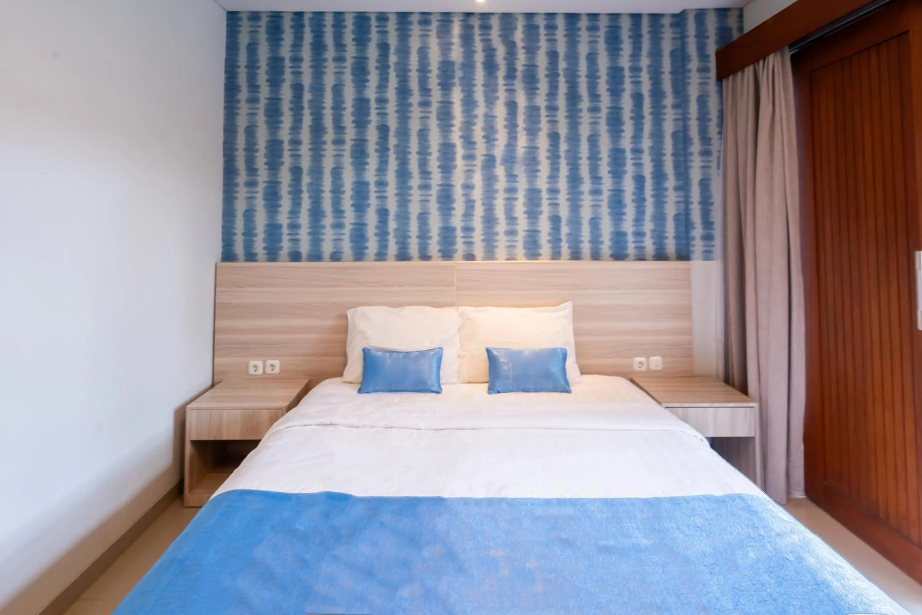 Bed in Mahesa Suites Seminyak