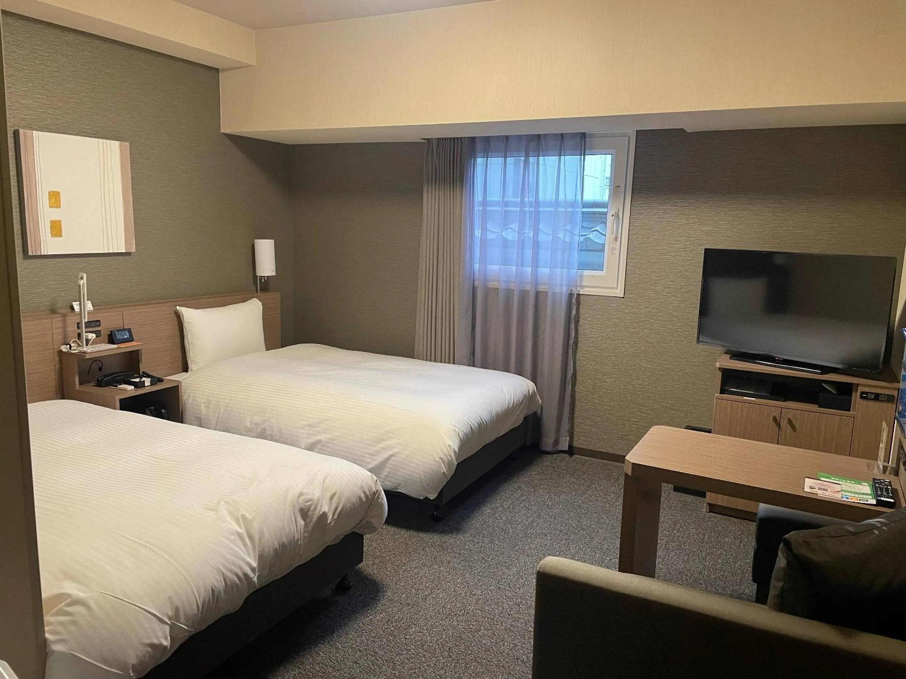 Photo of the whole room, Bed in Hotel Route-Inn Sakurai Ekimae