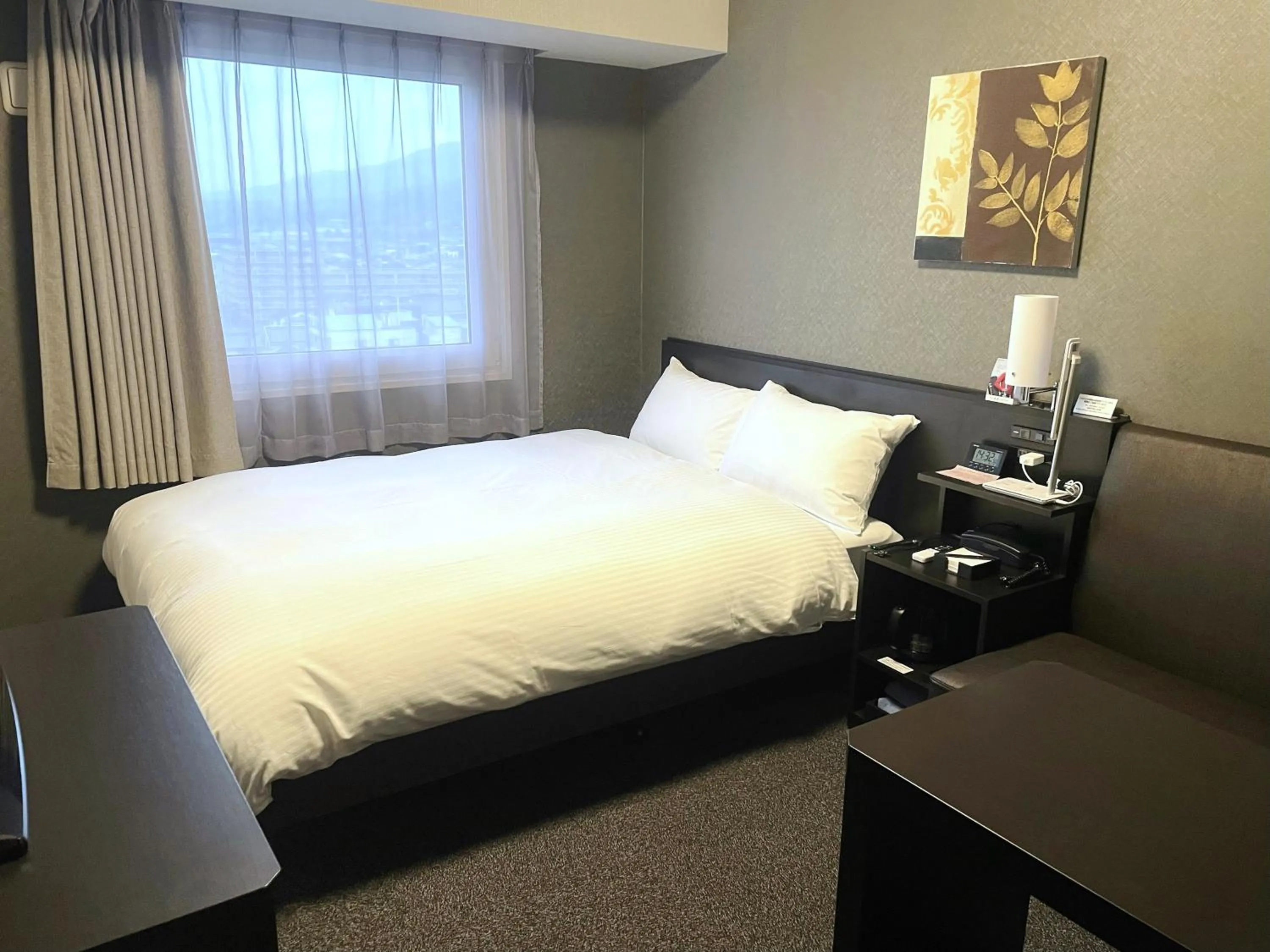 Photo of the whole room, Bed in Hotel Route-Inn Sakurai Ekimae