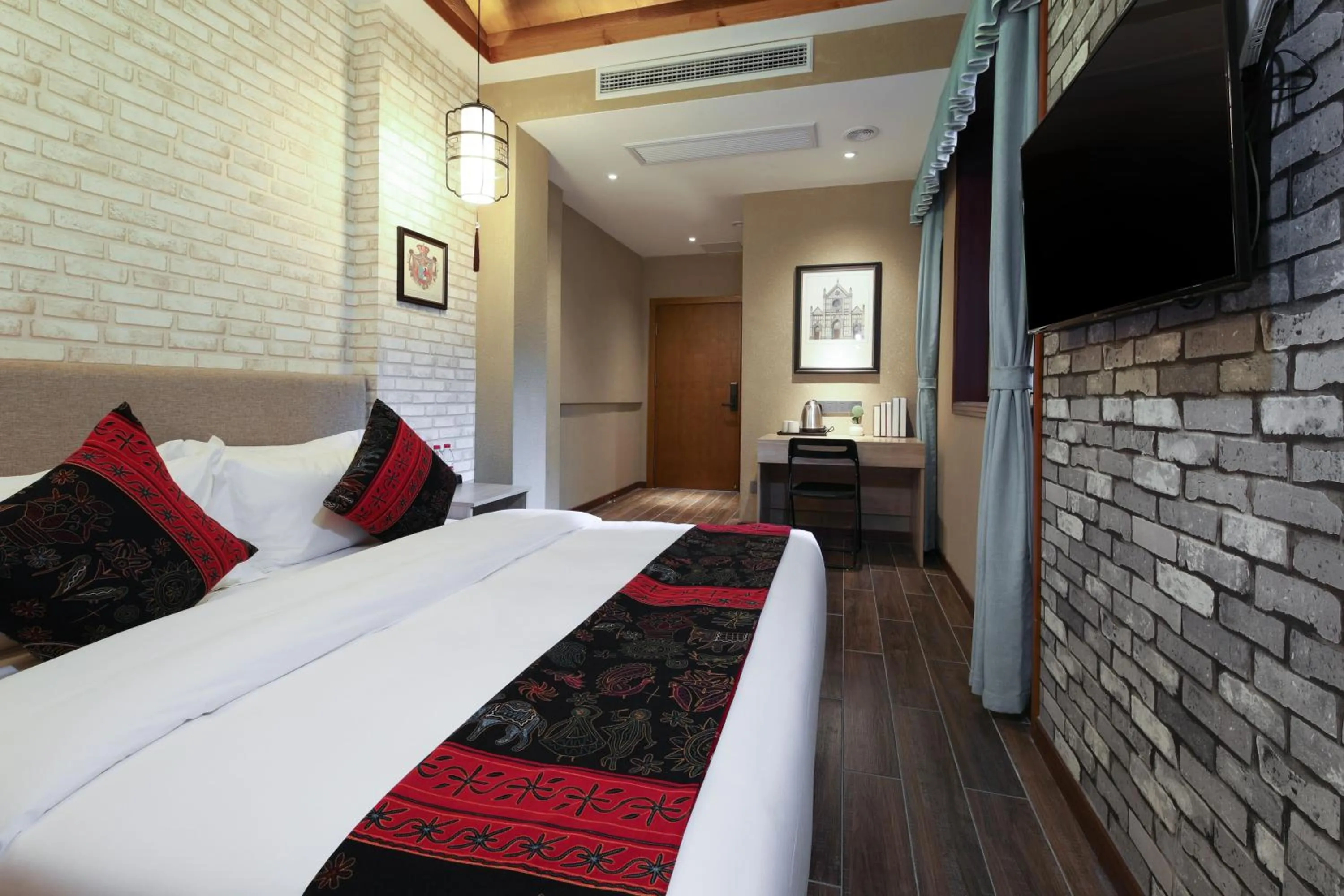 Bed in Zou Qu Ye Travel Hotel