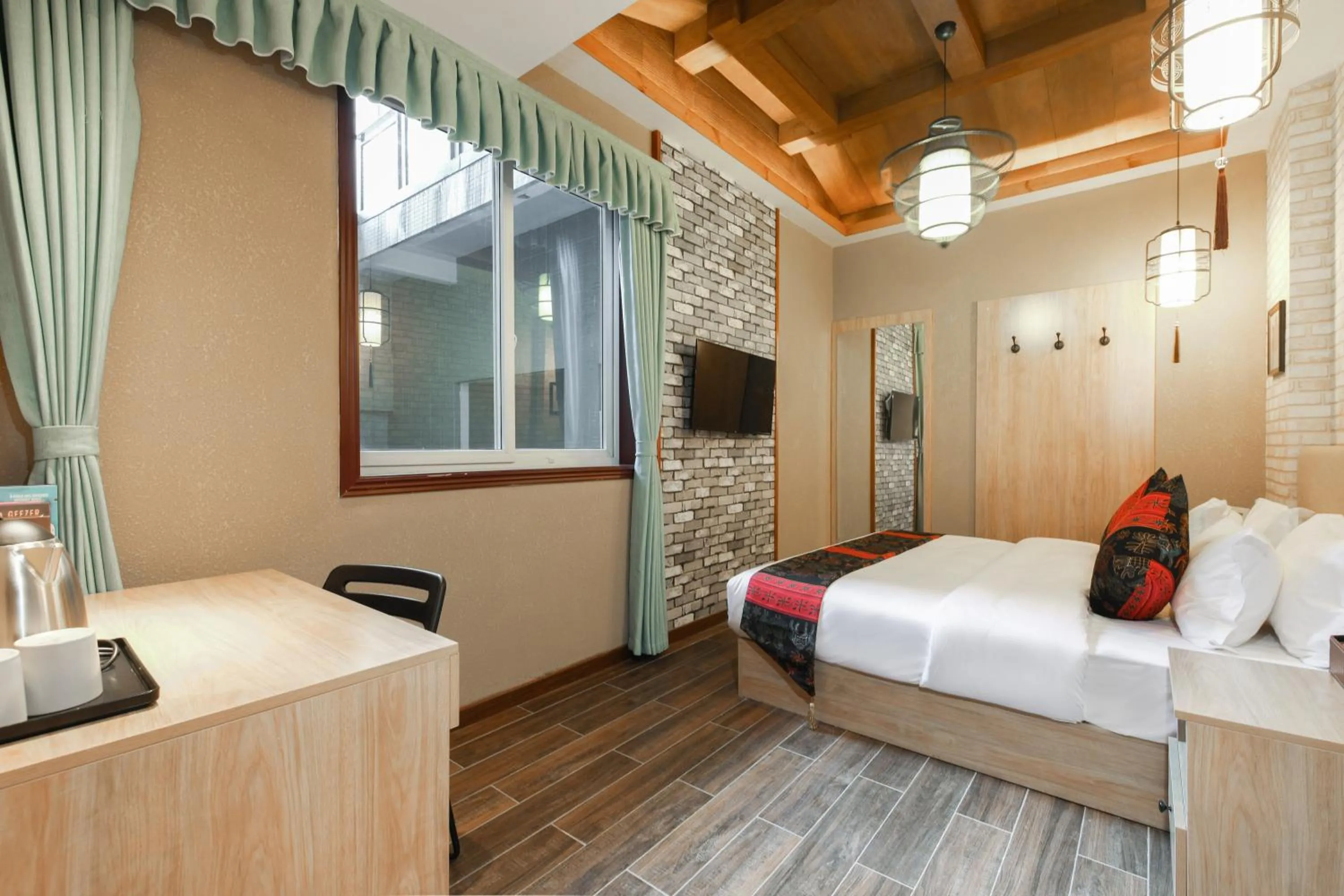 Bed in Zou Qu Ye Travel Hotel