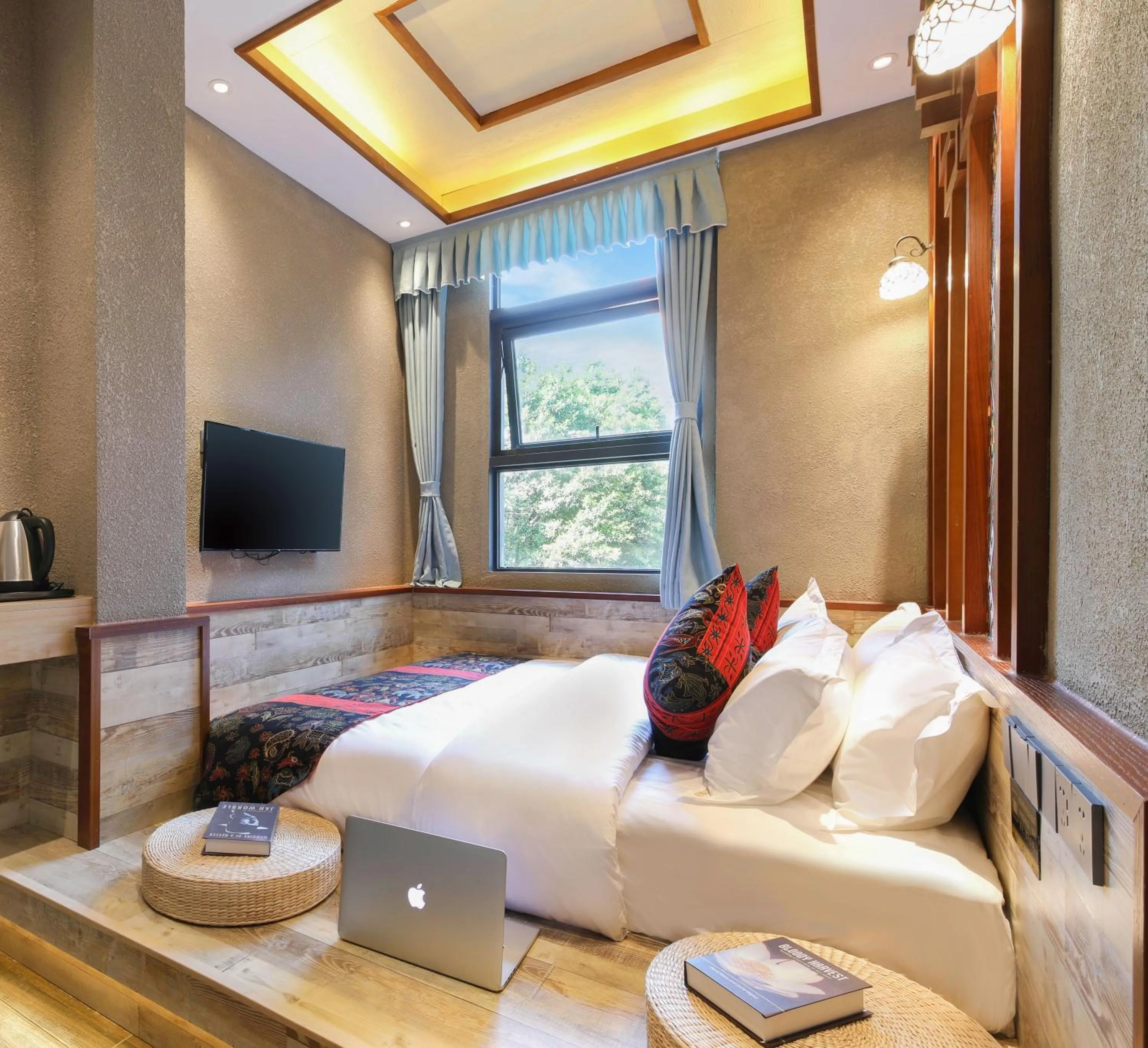 Bed in Zou Qu Ye Travel Hotel