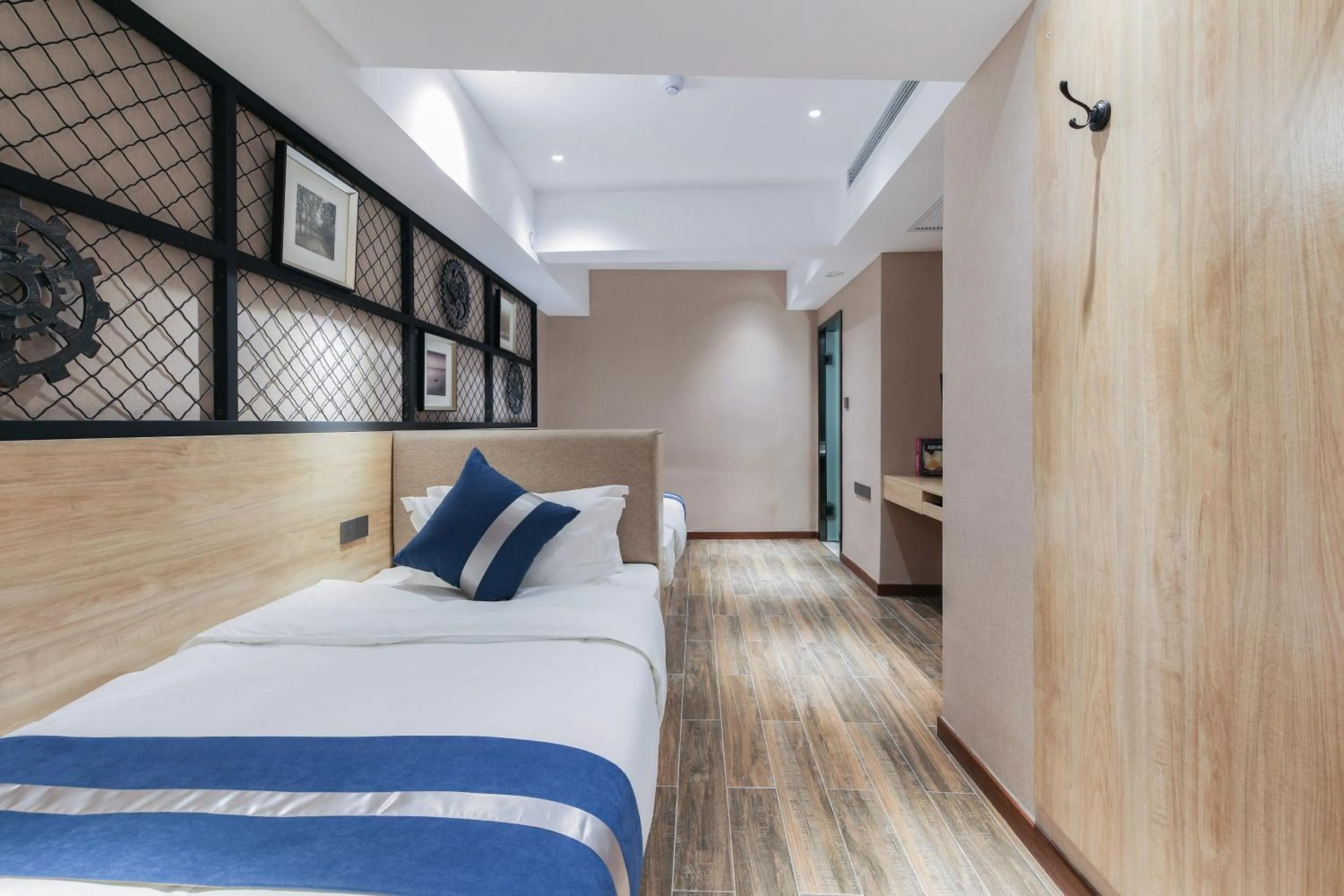 Bed in Zou Qu Ye Travel Hotel