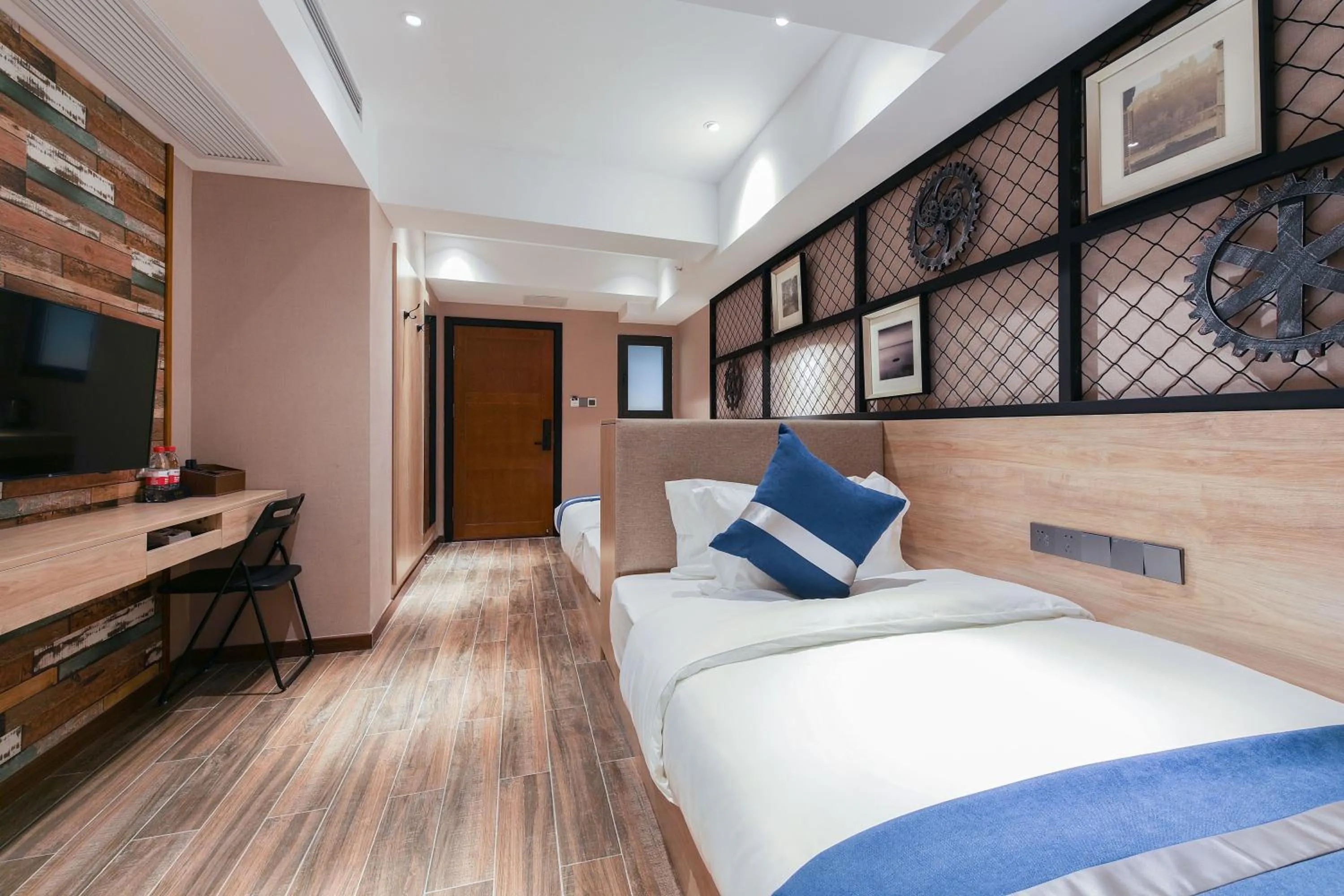 Bed in Zou Qu Ye Travel Hotel