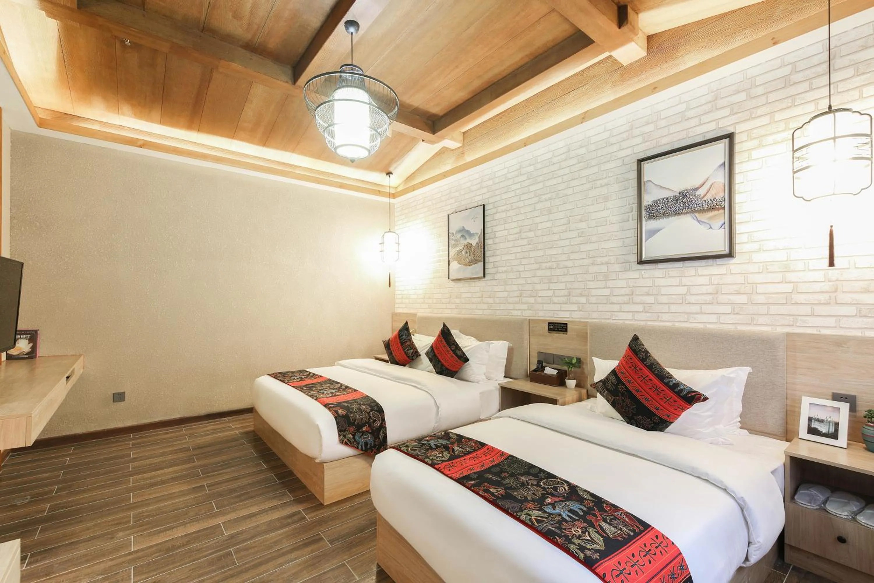 Bed in Zou Qu Ye Travel Hotel