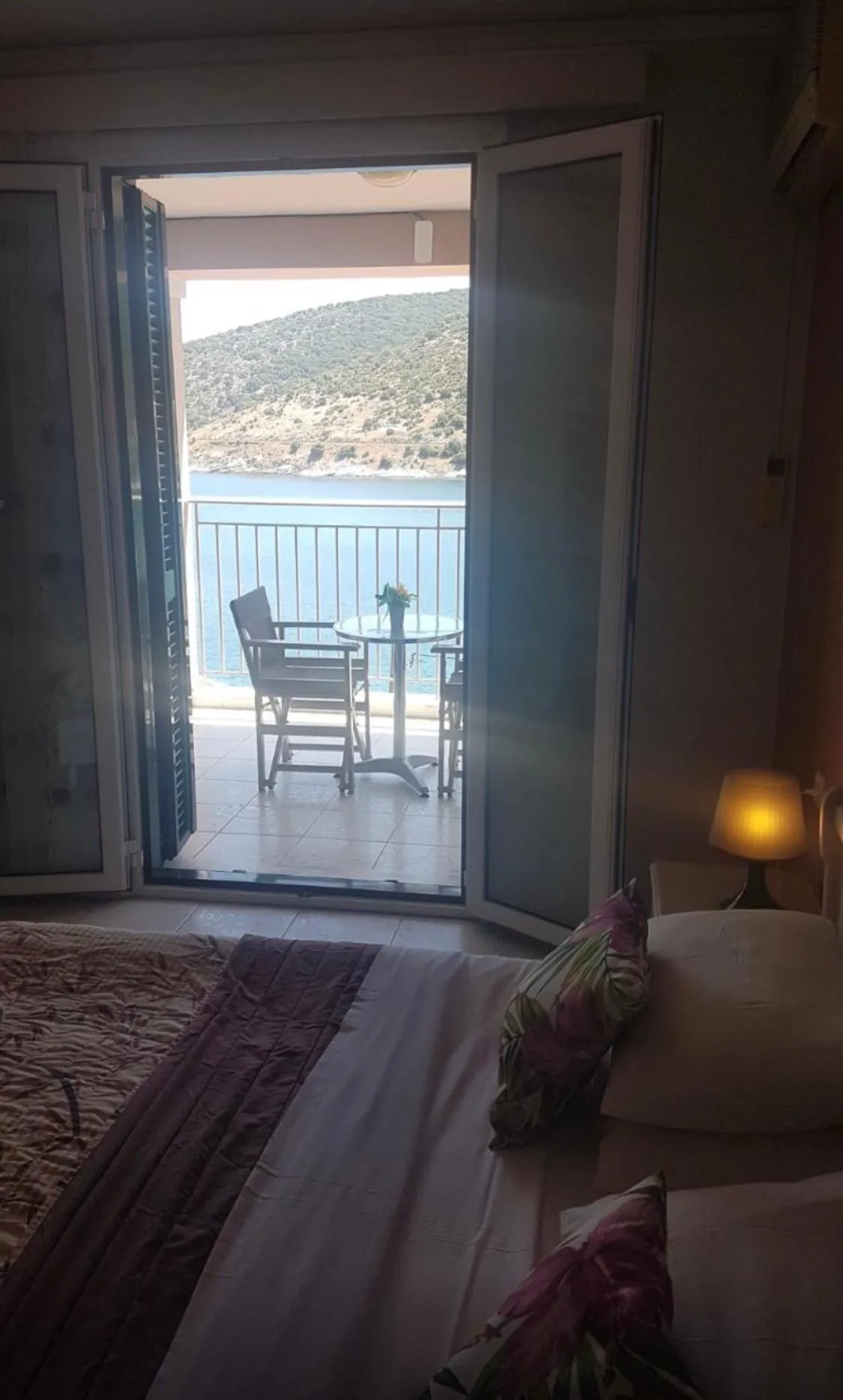 Bed in Poseidon Apartments