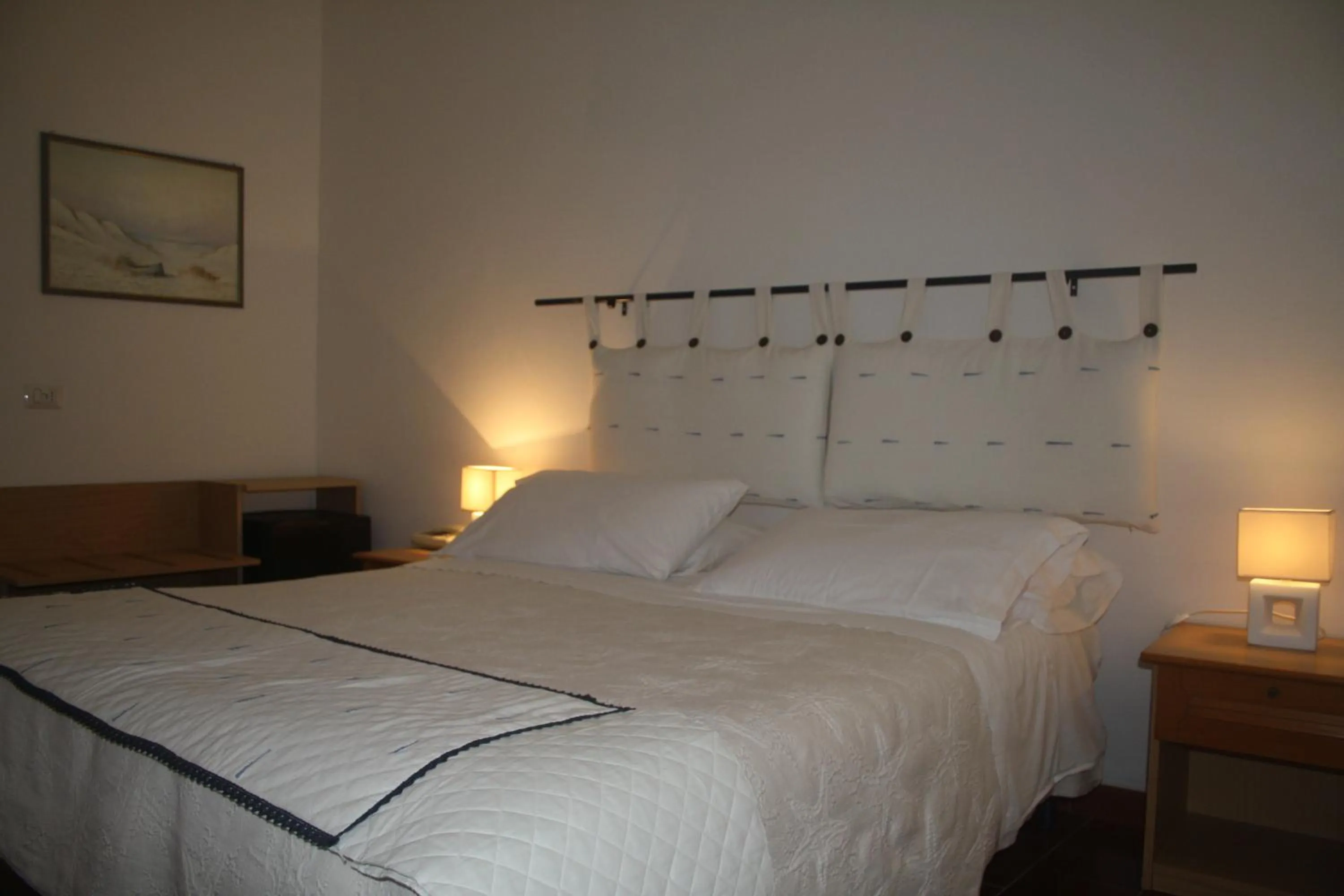 Bed in Hotel Da Cecco