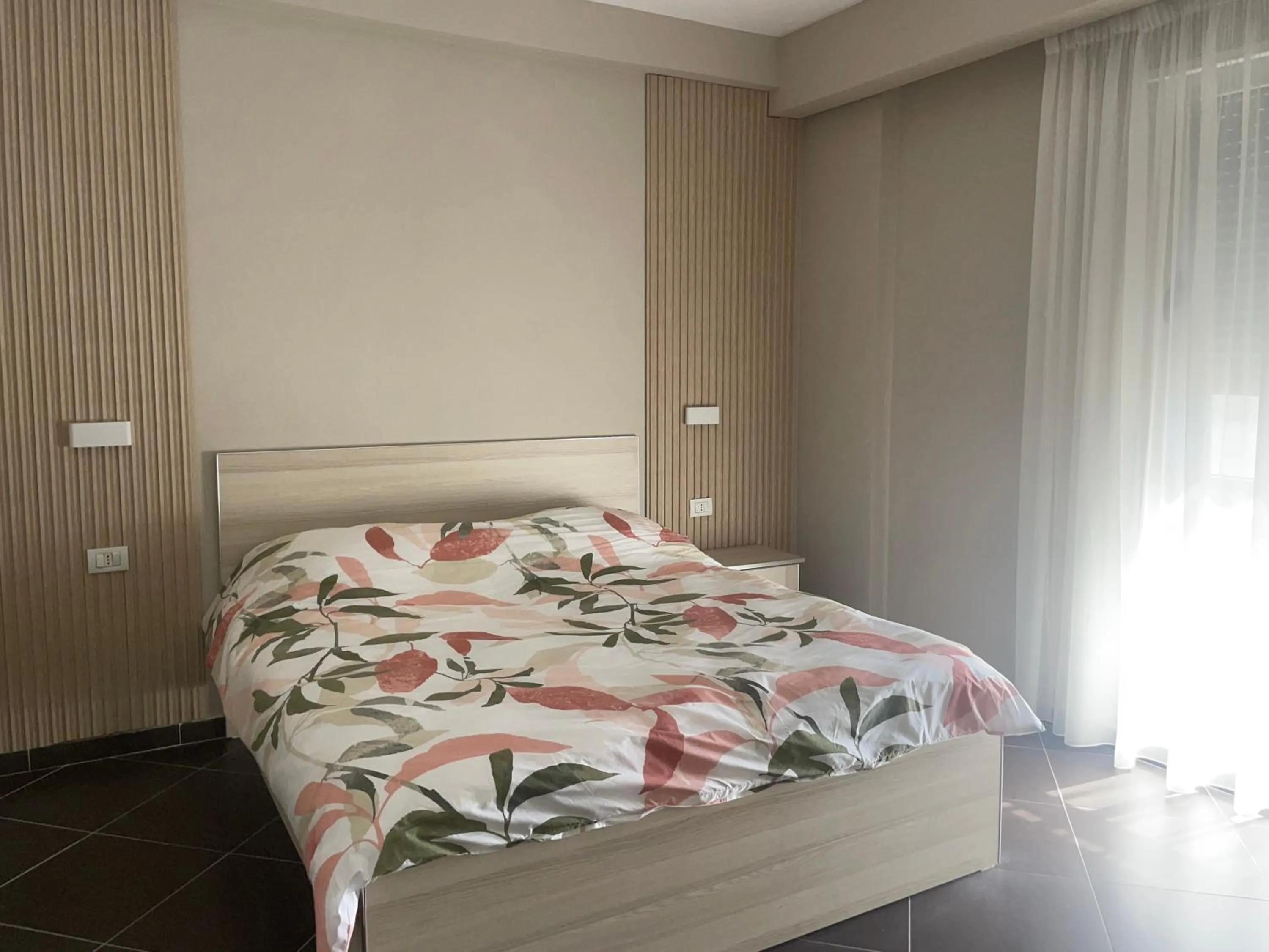 Bed in Hotel Nais Beach