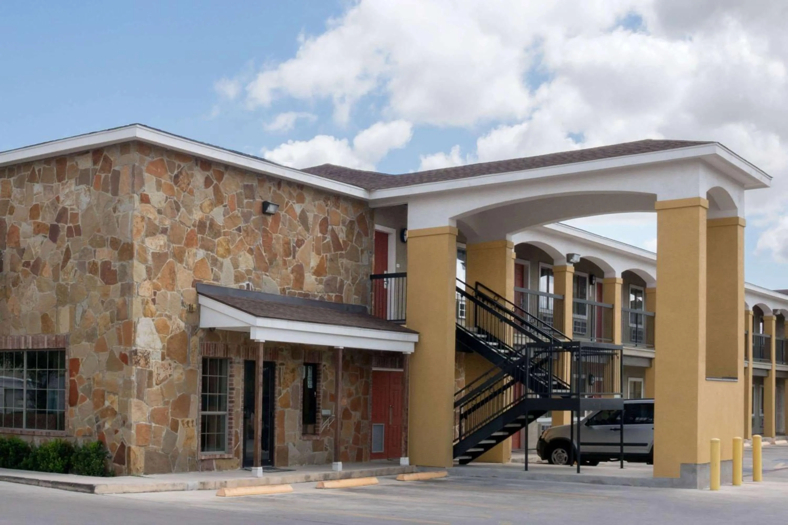 Property building in Super 8 by Wyndham San Antonio Near Fort Sam Houston