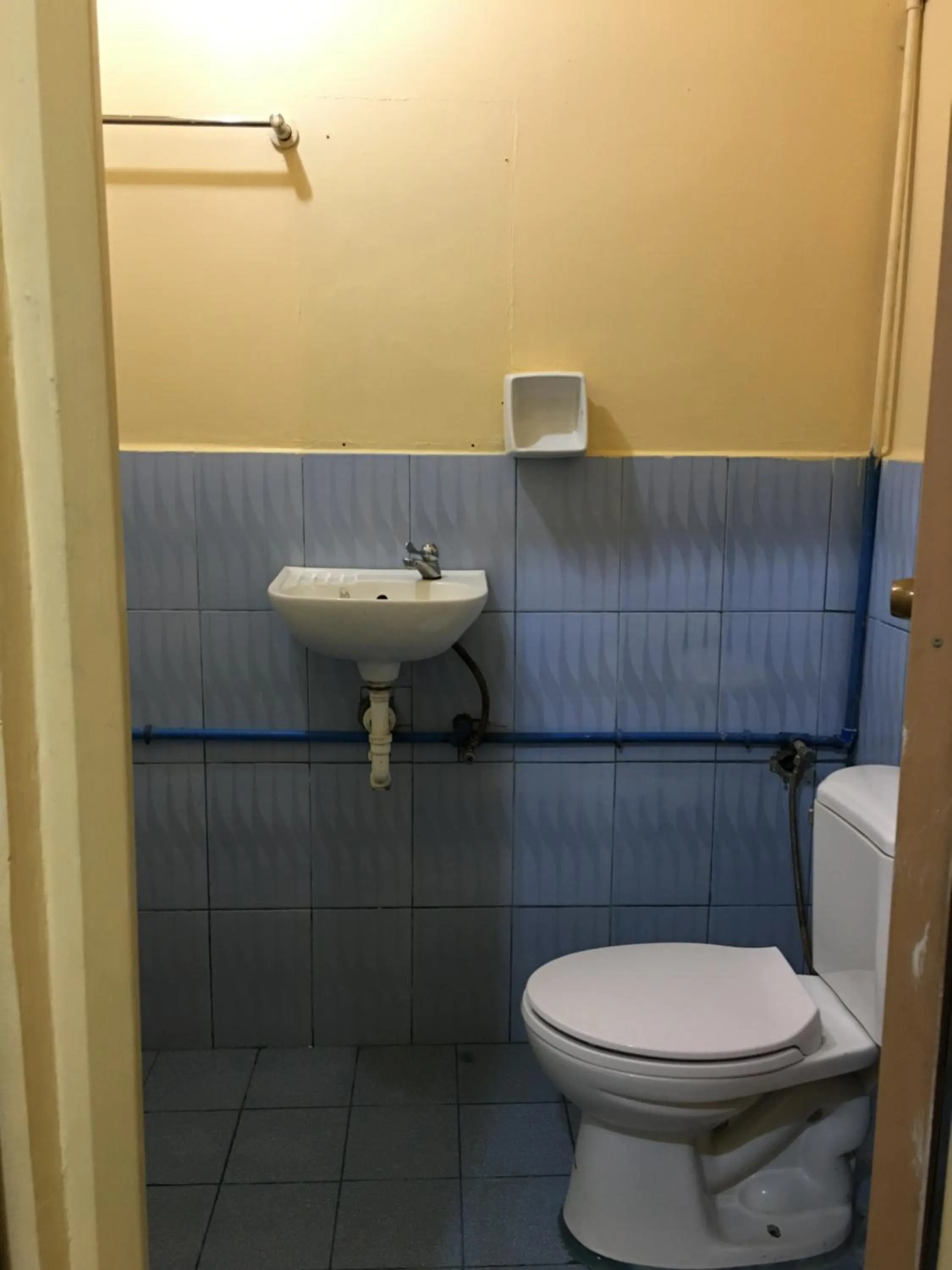 Toilet in Querencia Inn