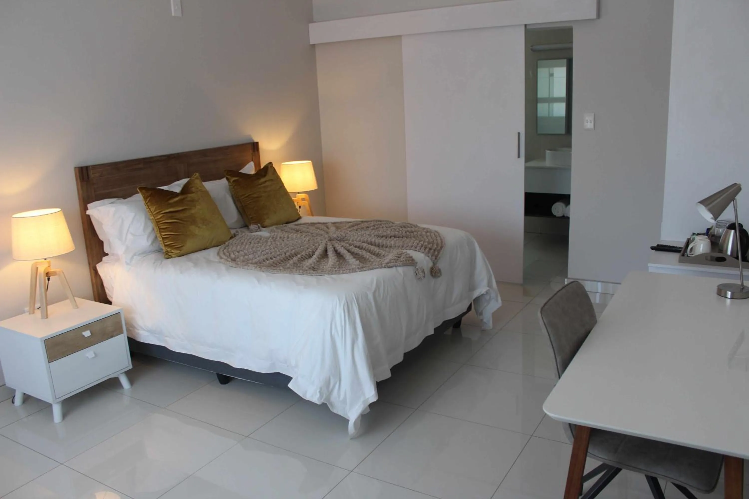 Bed in Prisatt Boutique Hotel