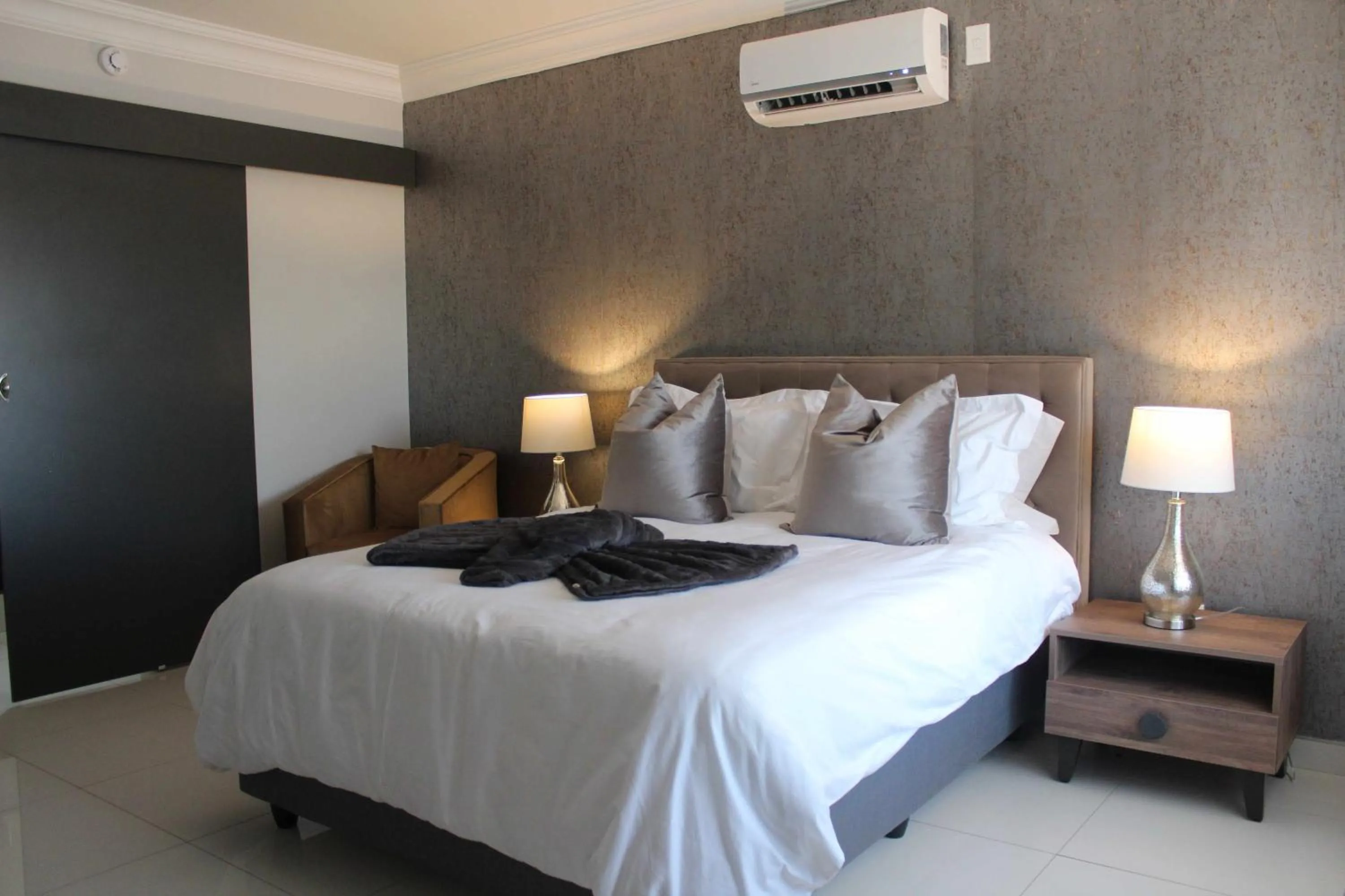 Bed in Prisatt Boutique Hotel