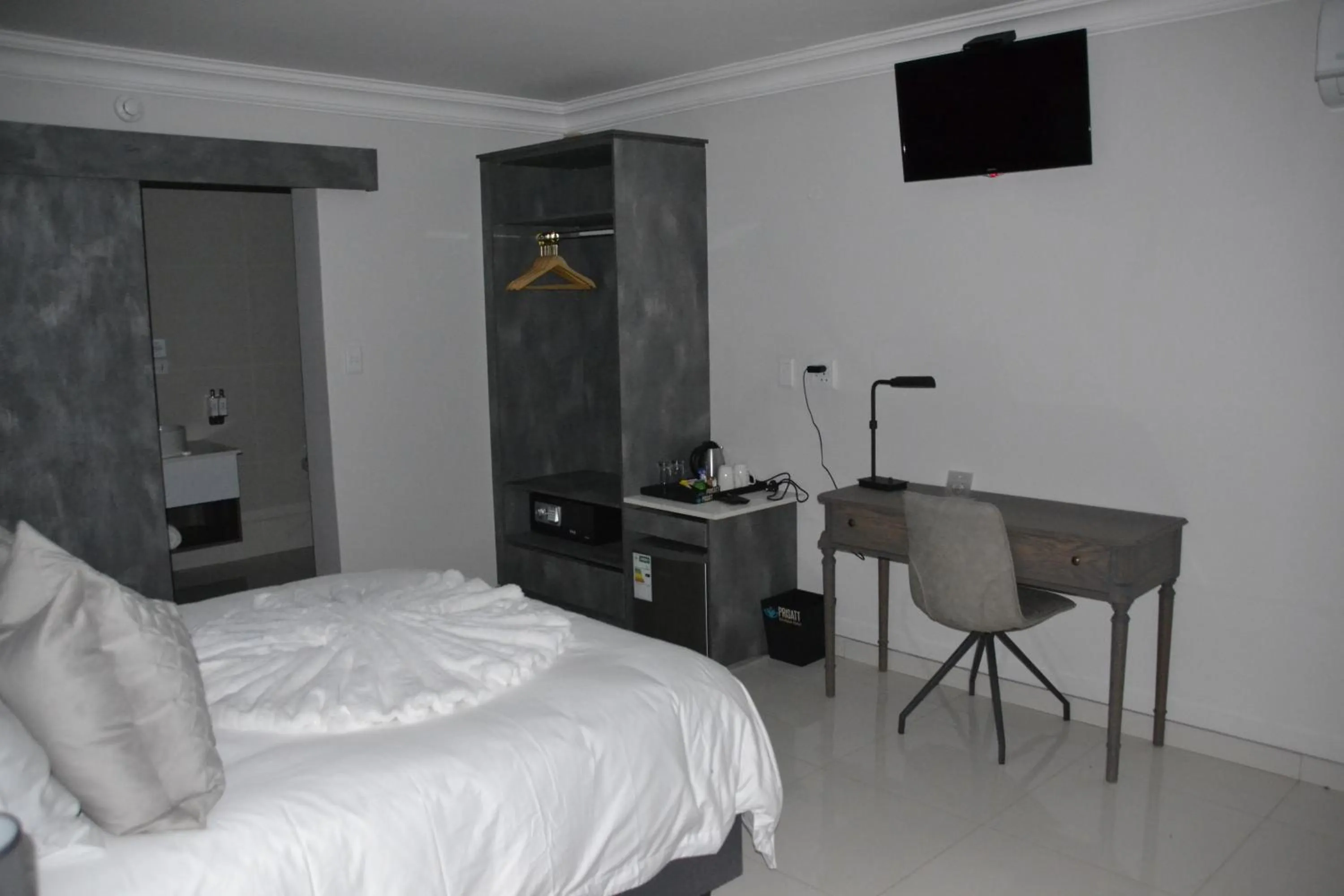 Bed in Prisatt Boutique Hotel