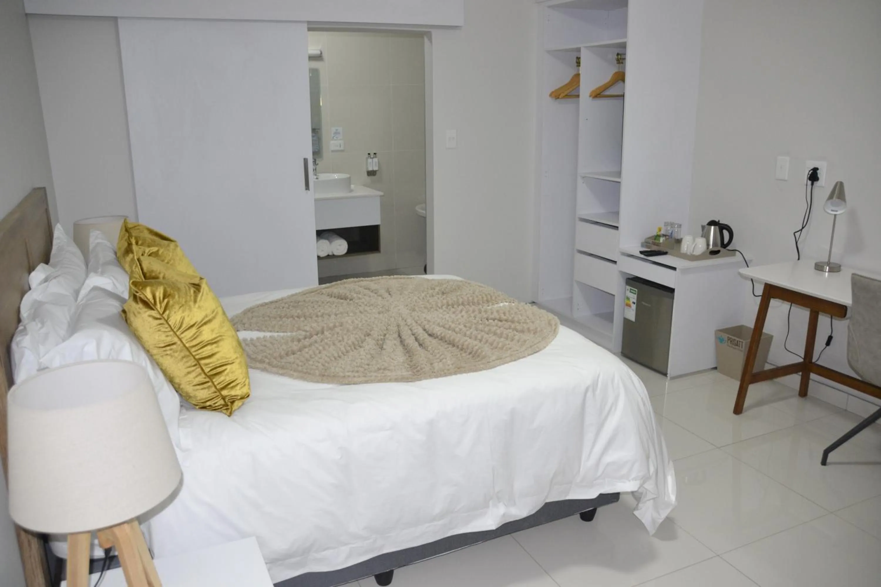 Bed in Prisatt Boutique Hotel