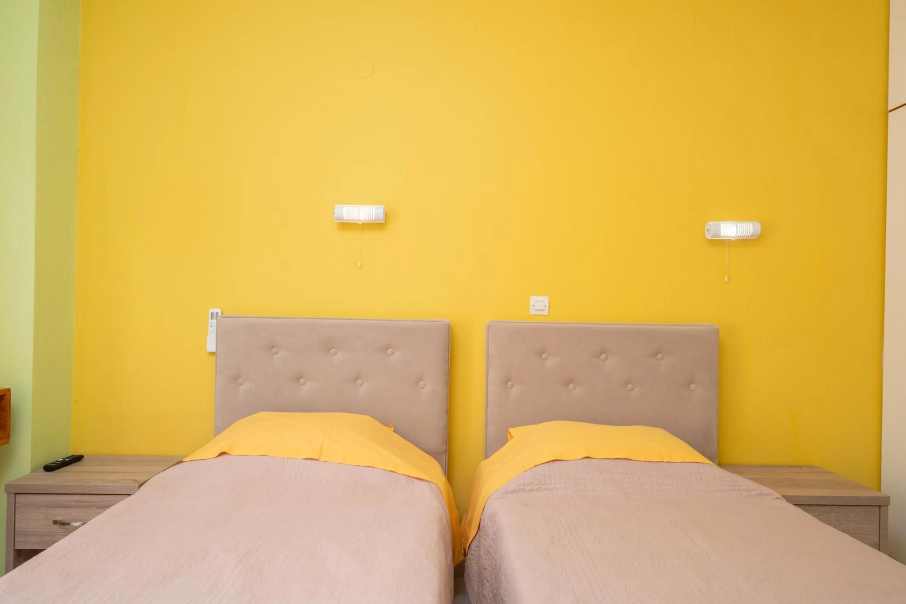 Bed in Remezzo Apartments