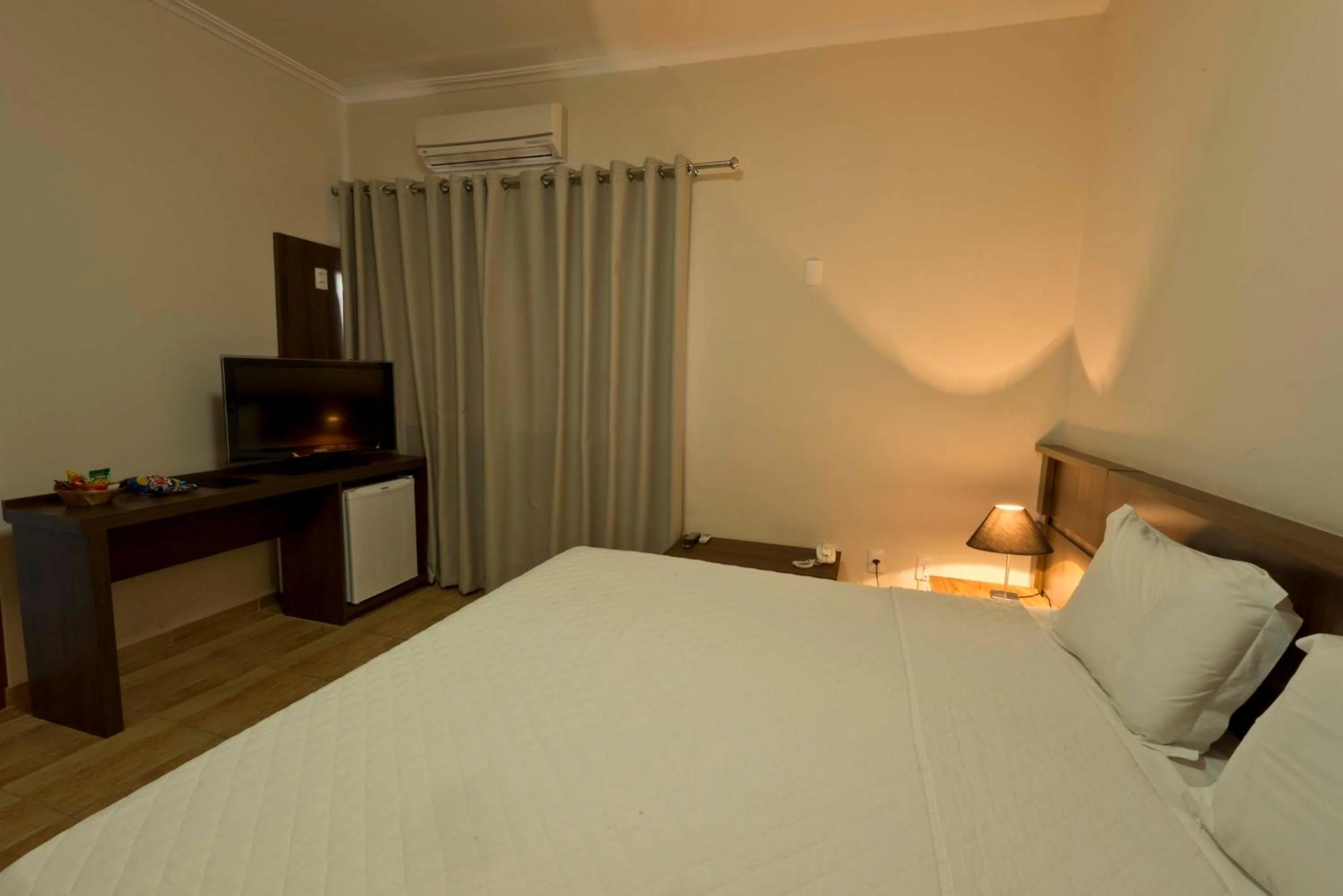 Photo of the whole room, Bed in Grand Enio Hotel e Cantina