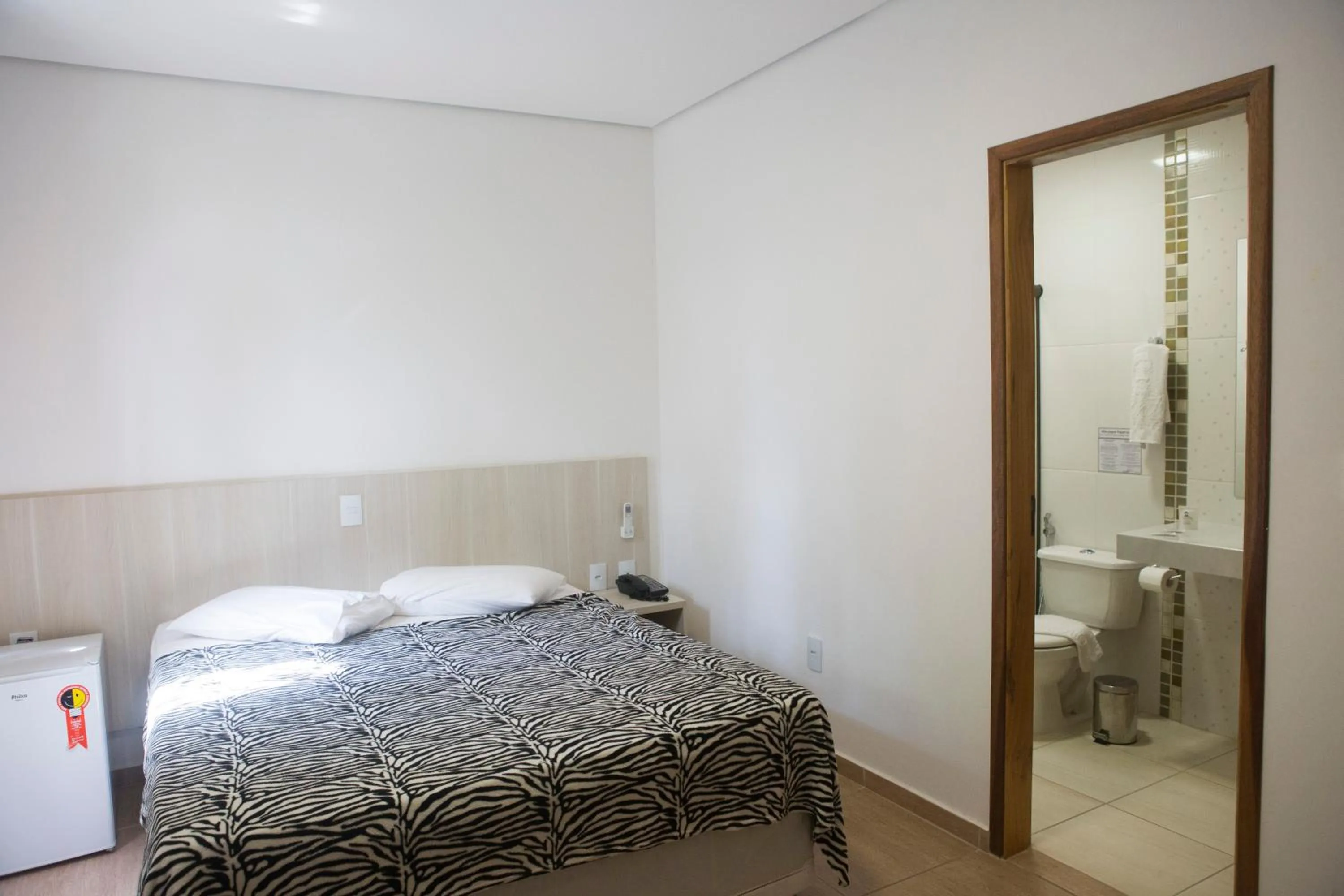 Bed in Grand Enio Hotel e Cantina