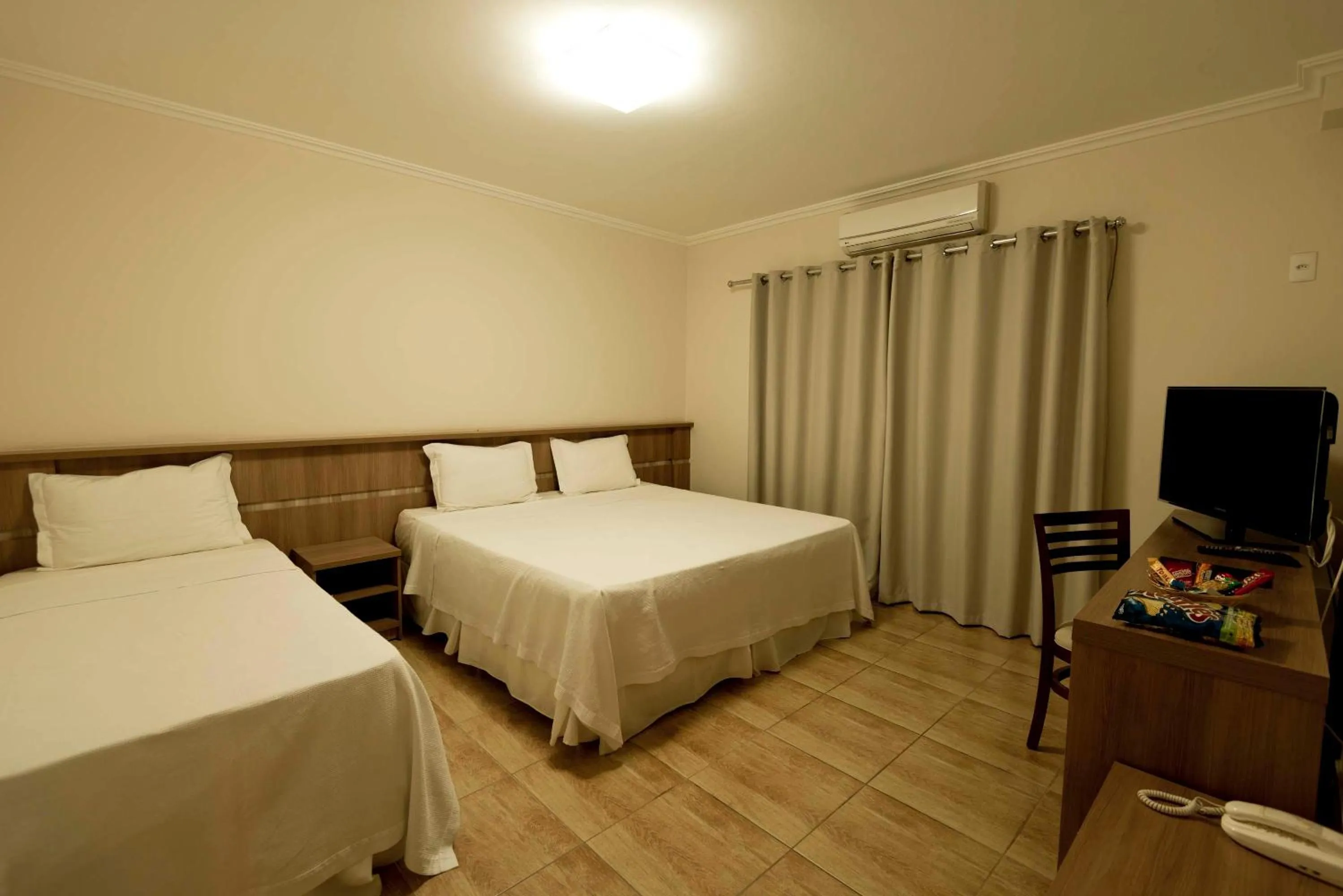 Photo of the whole room, Bed in Grand Enio Hotel e Cantina