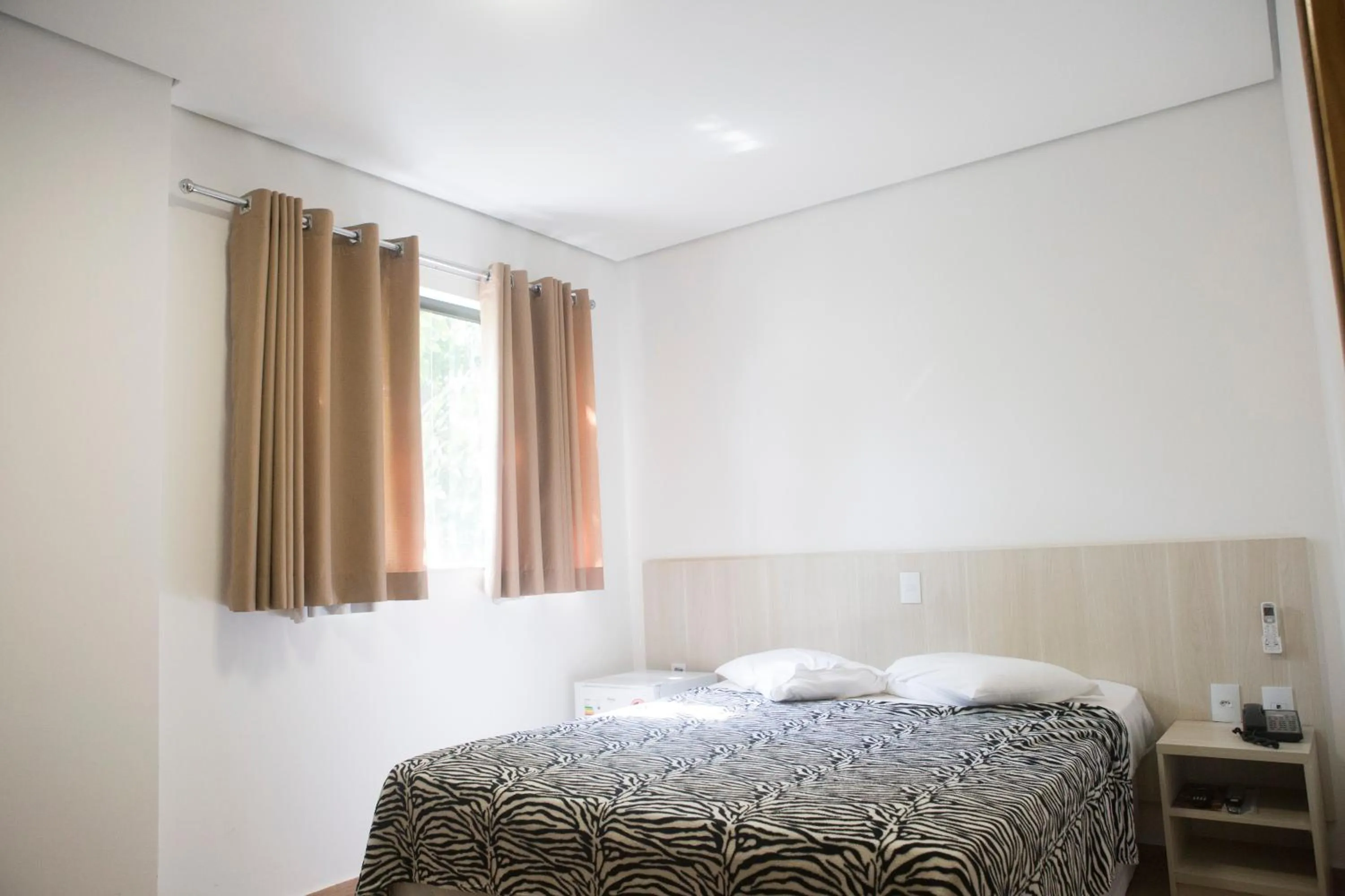 Bed in Grand Enio Hotel e Cantina