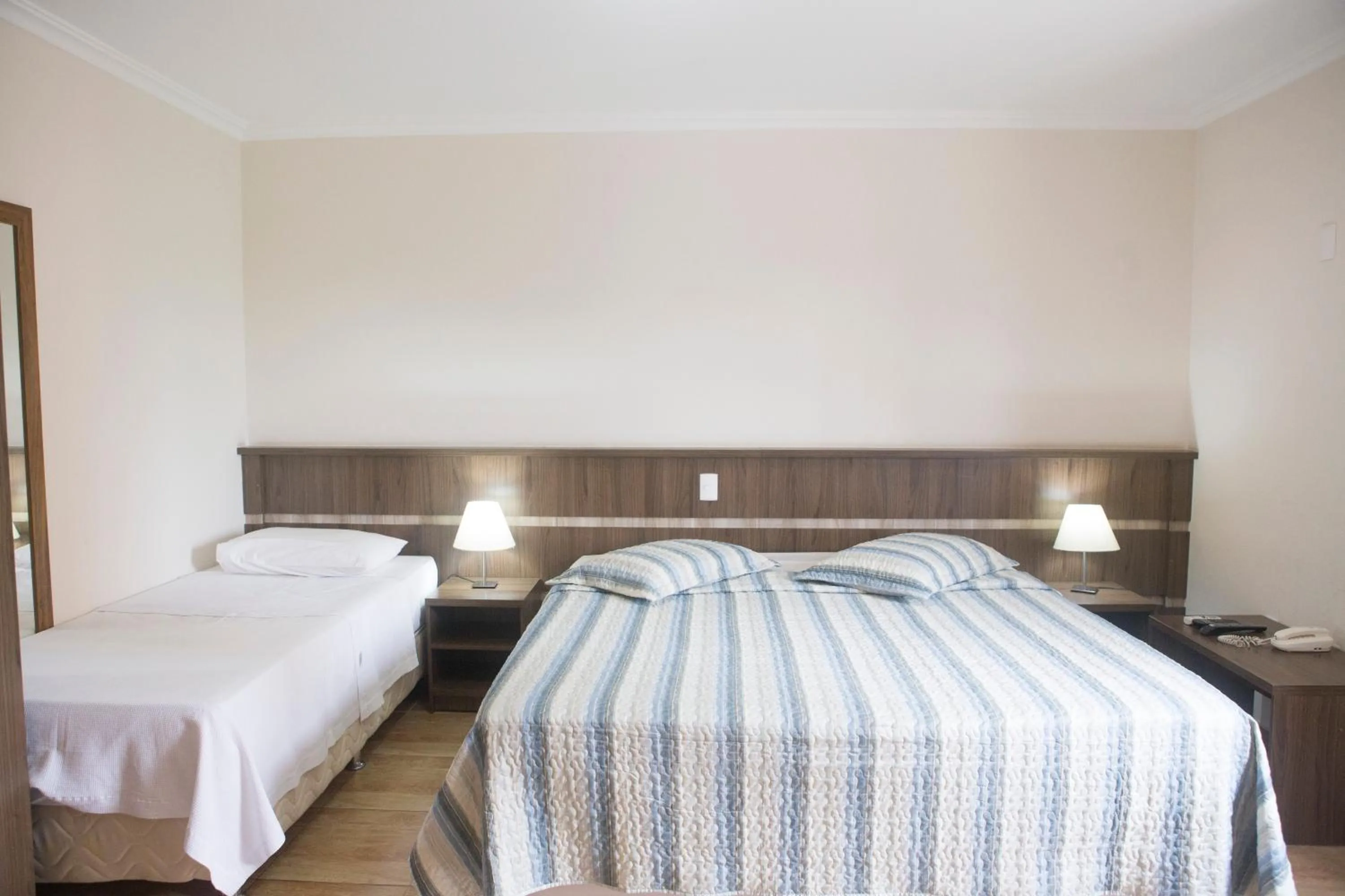 Bed in Grand Enio Hotel e Cantina