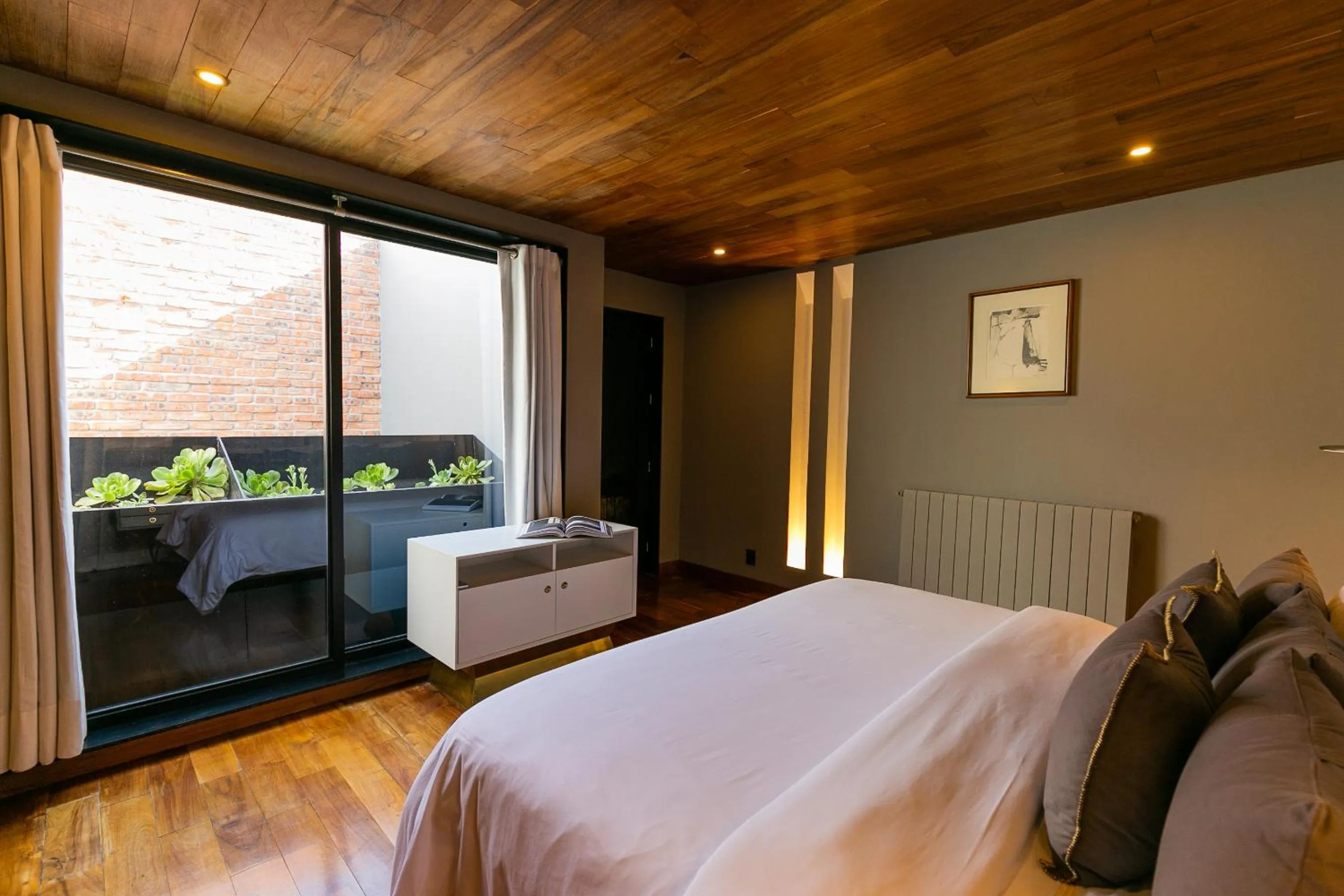 Bed in Dos Casas Hotel & Spa