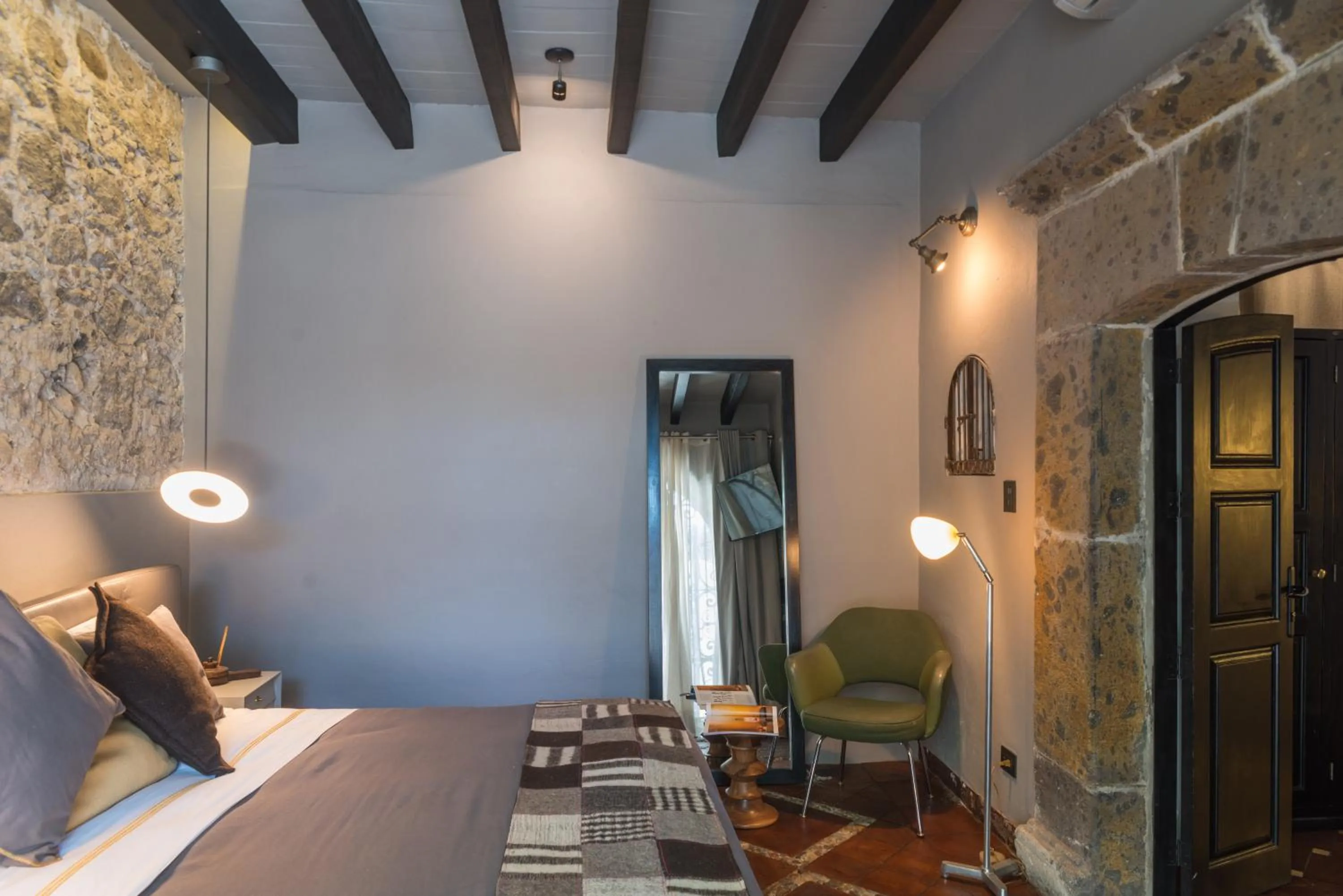 Bedroom in Dos Casas Hotel & Spa