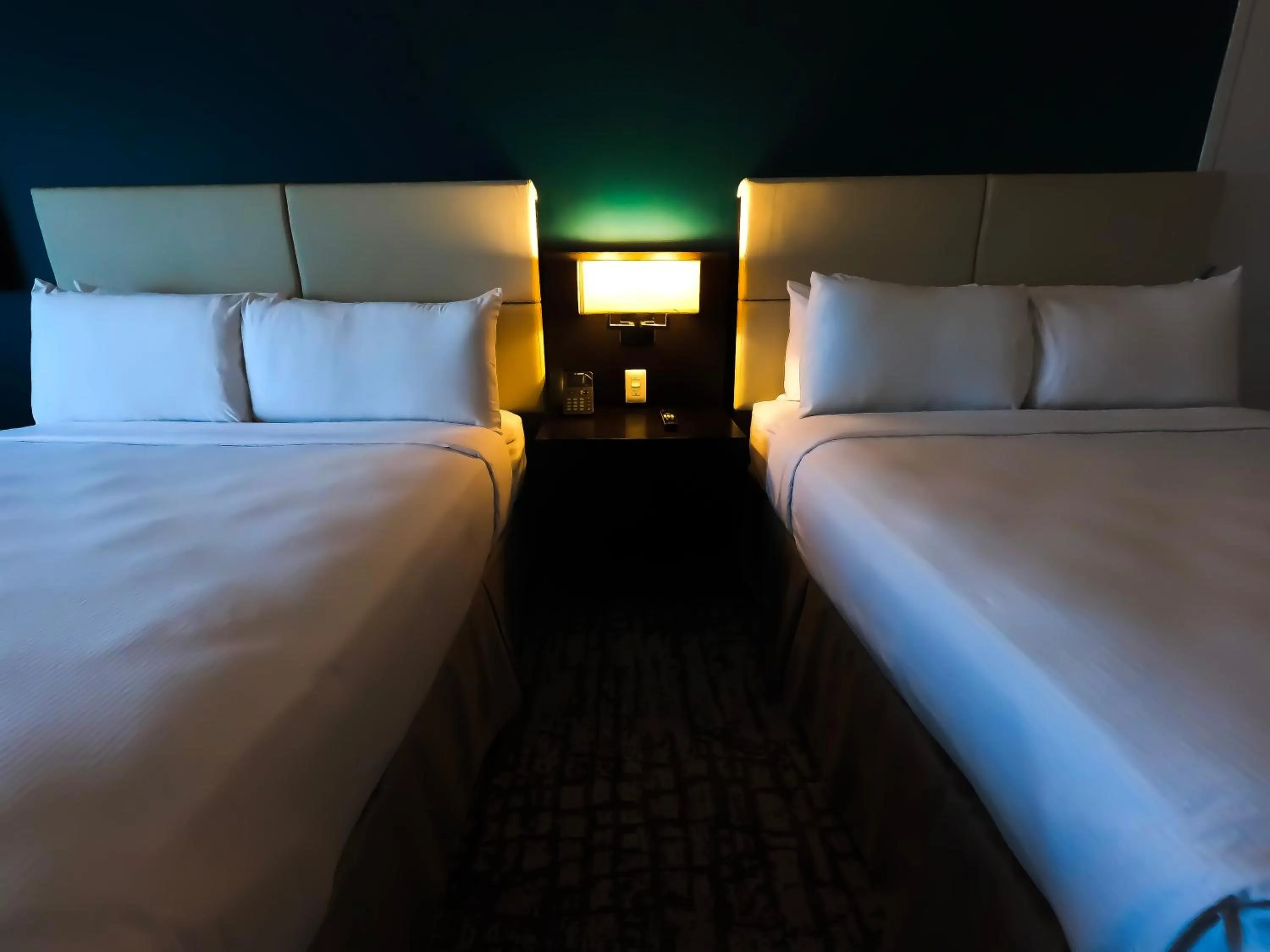 Bed in Costa Bahia Hotel, Convention Center and Casino