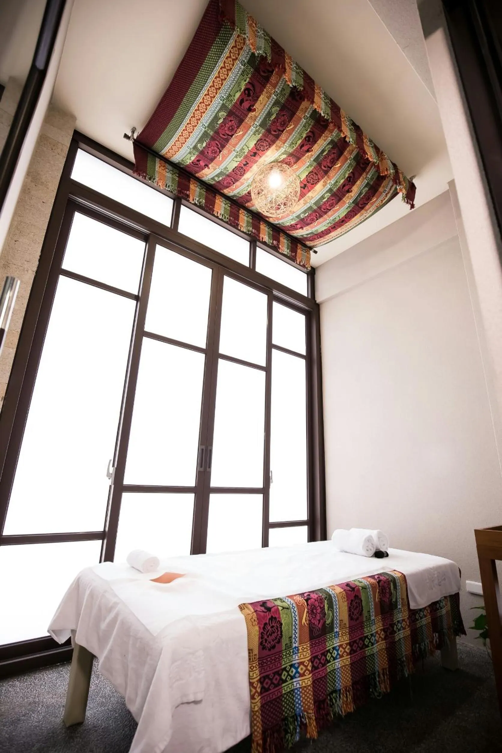 Bed in Tai-Yi Red Maple Resort