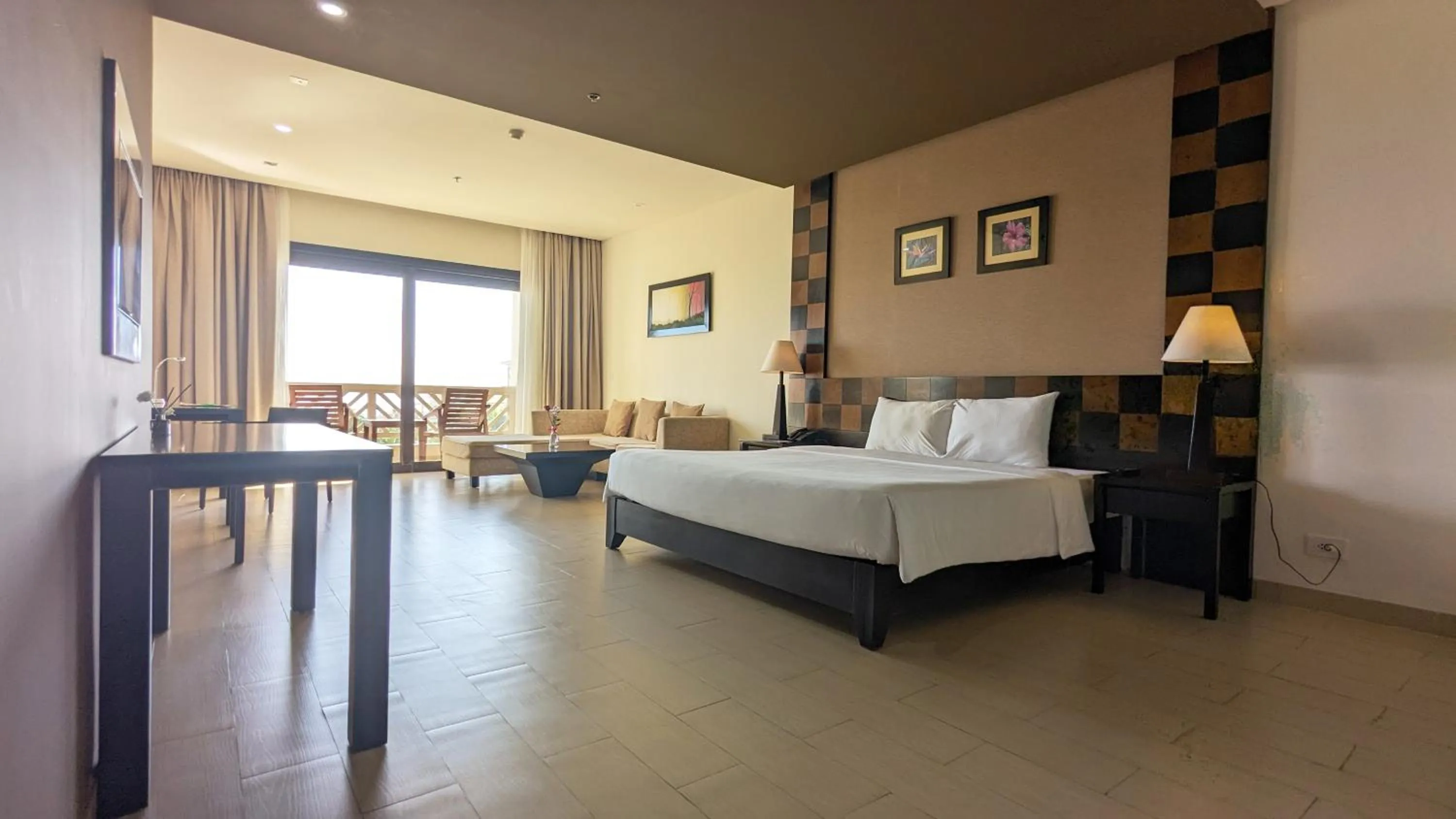 Bed in Olalani Resort & Condotel