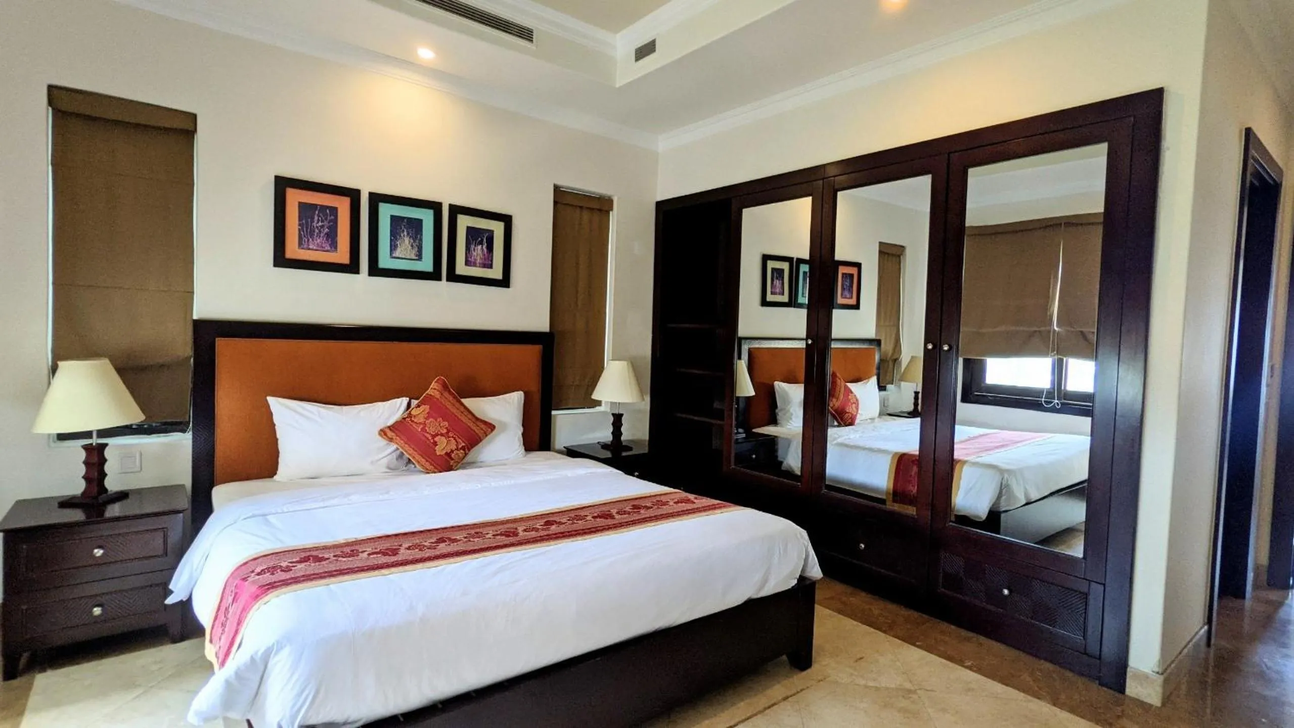 Bed in Olalani Resort & Condotel