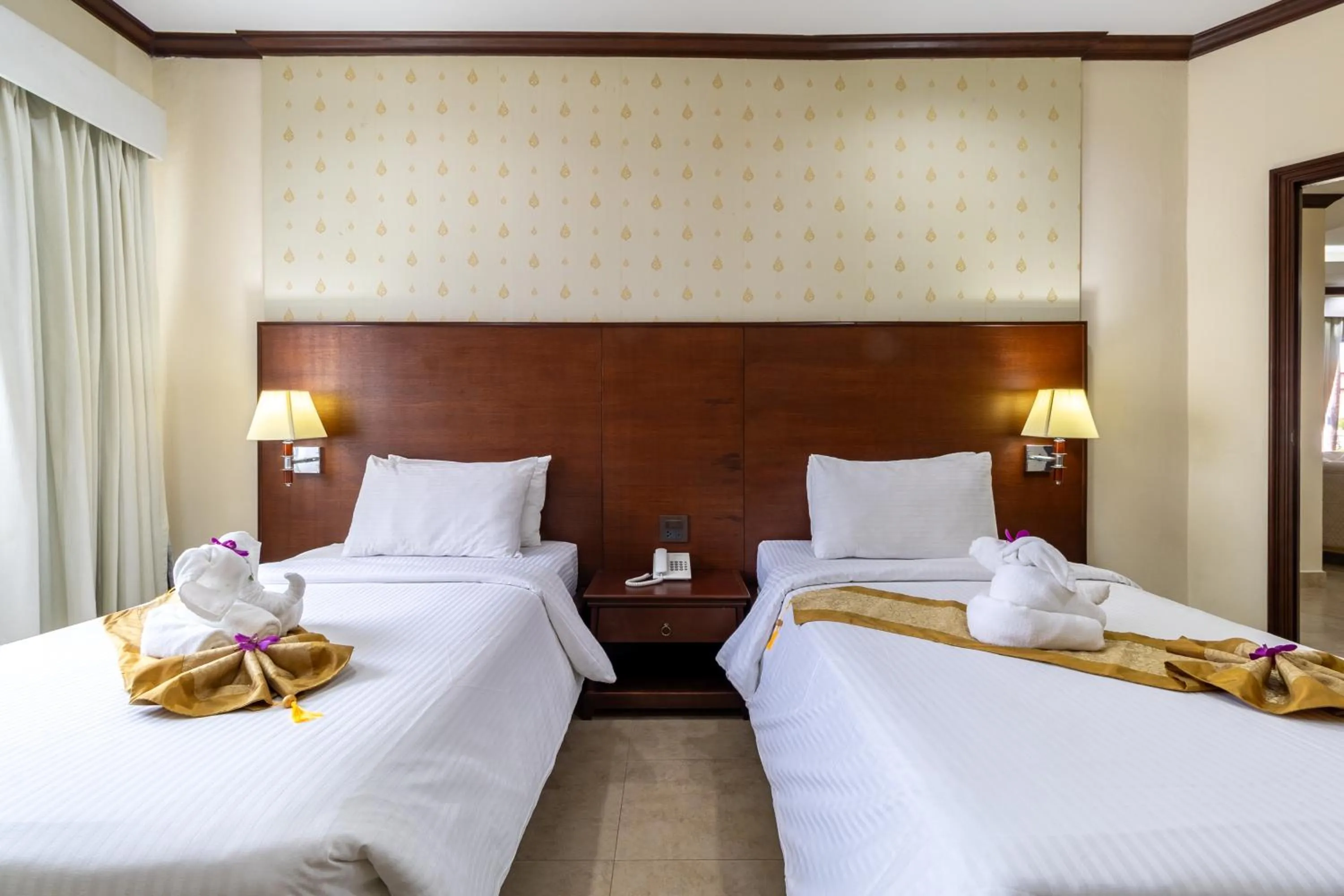 Bed in Thai Garden Resort