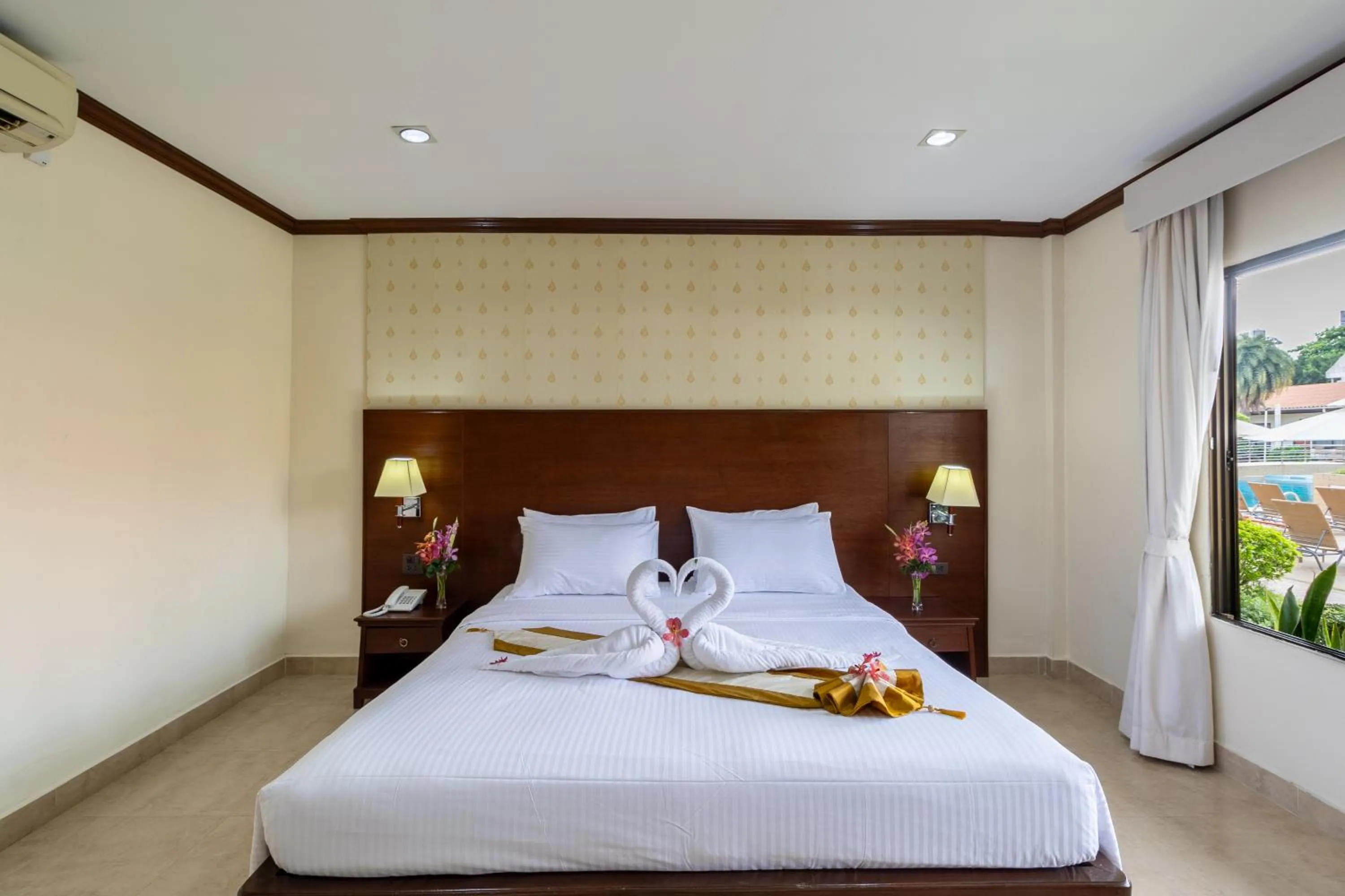 Bed in Thai Garden Resort