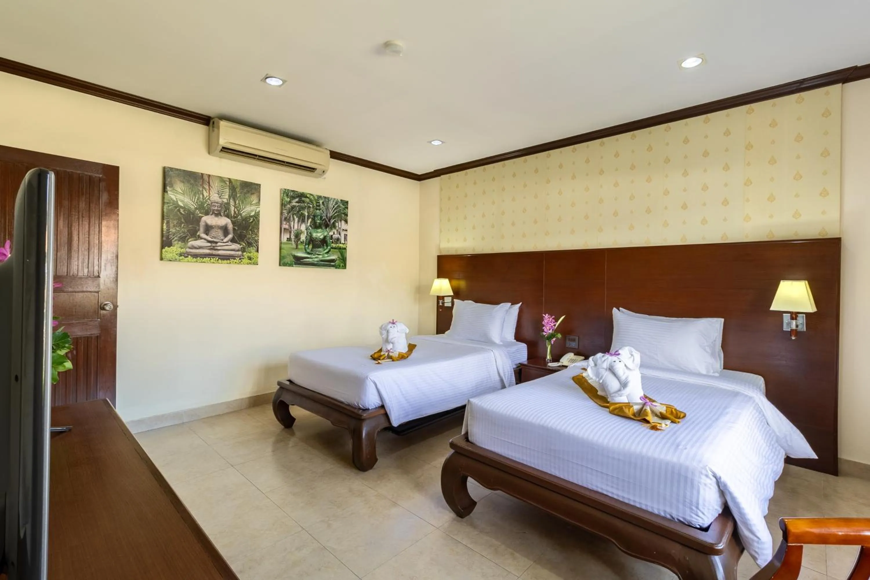 Bed in Thai Garden Resort