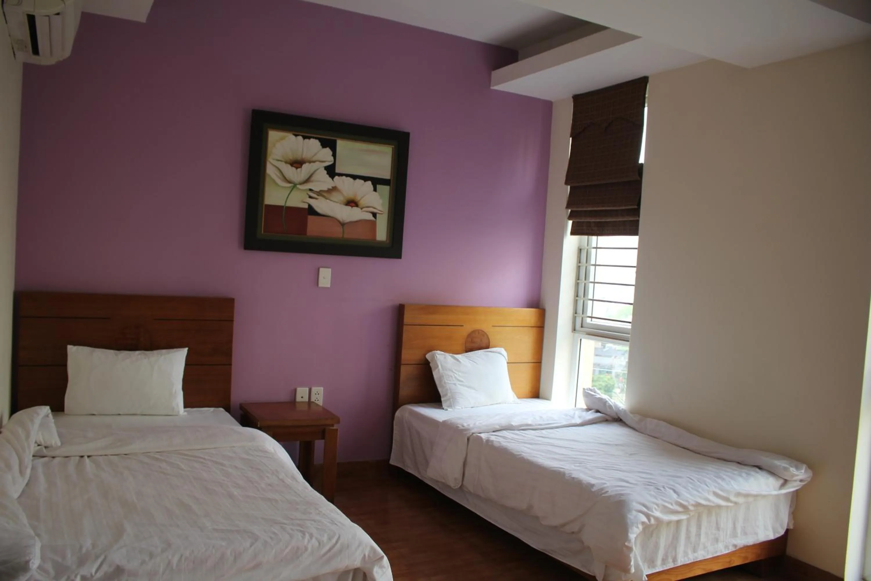 Bed in An Phú Motel