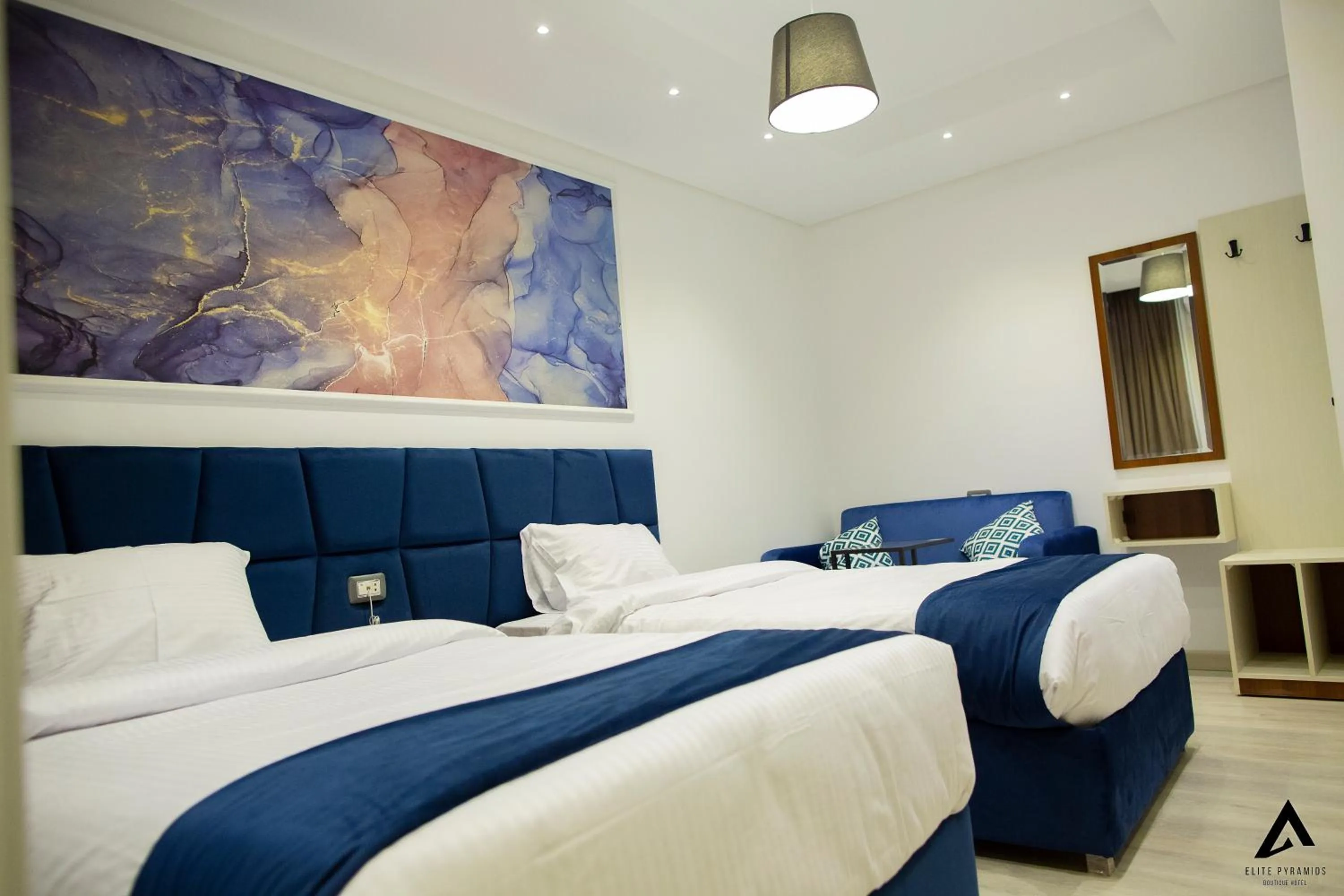 Bed in Elite Pyramids Boutique Hotel