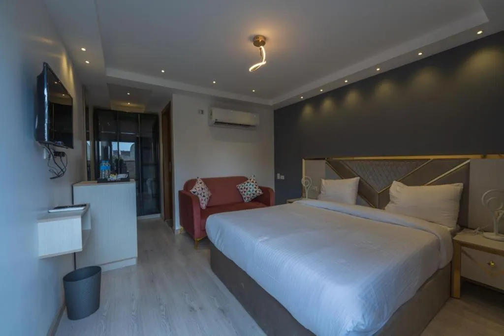 Bed in Elite Pyramids Boutique Hotel