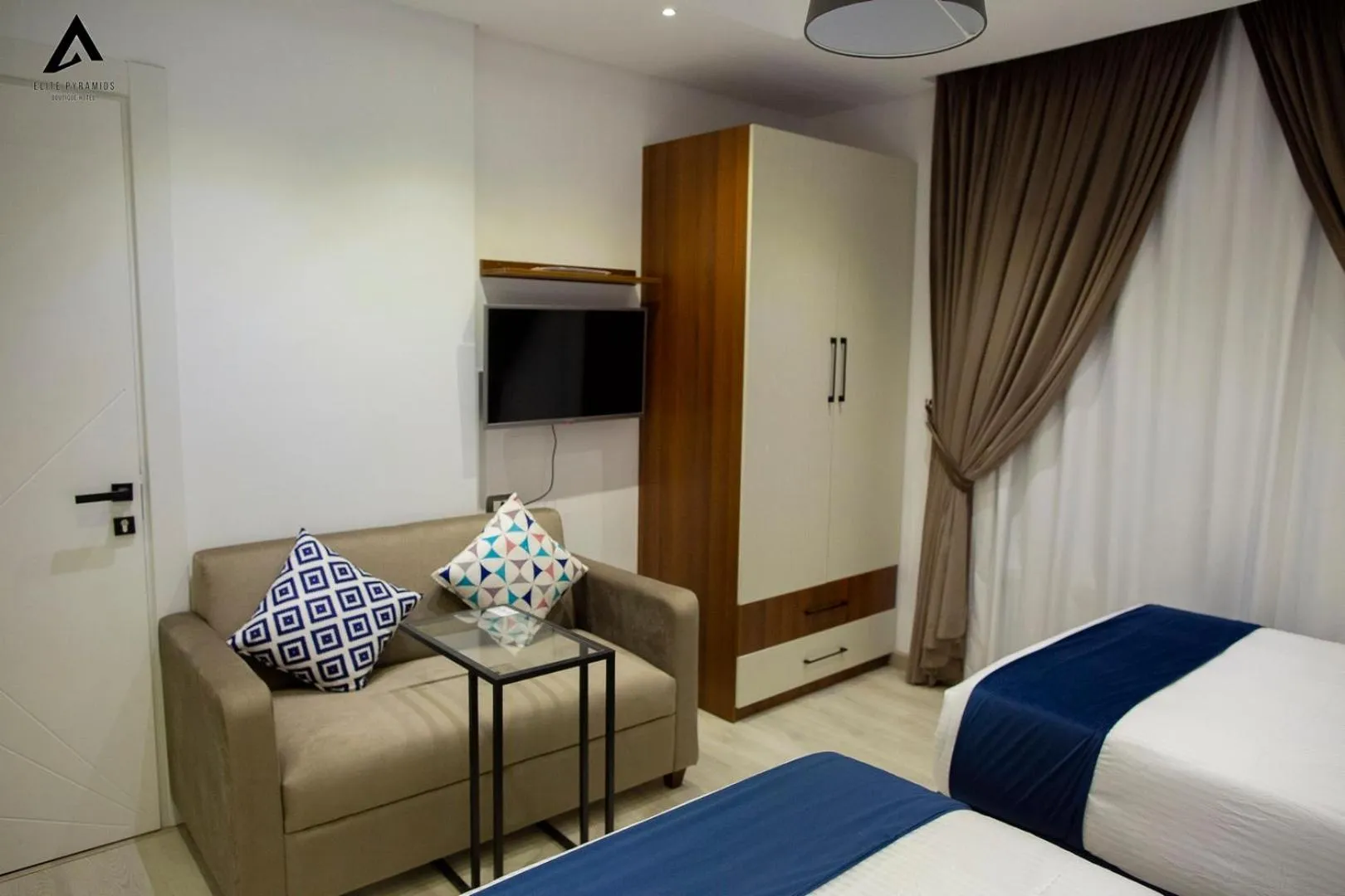 Bed in Elite Pyramids Boutique Hotel