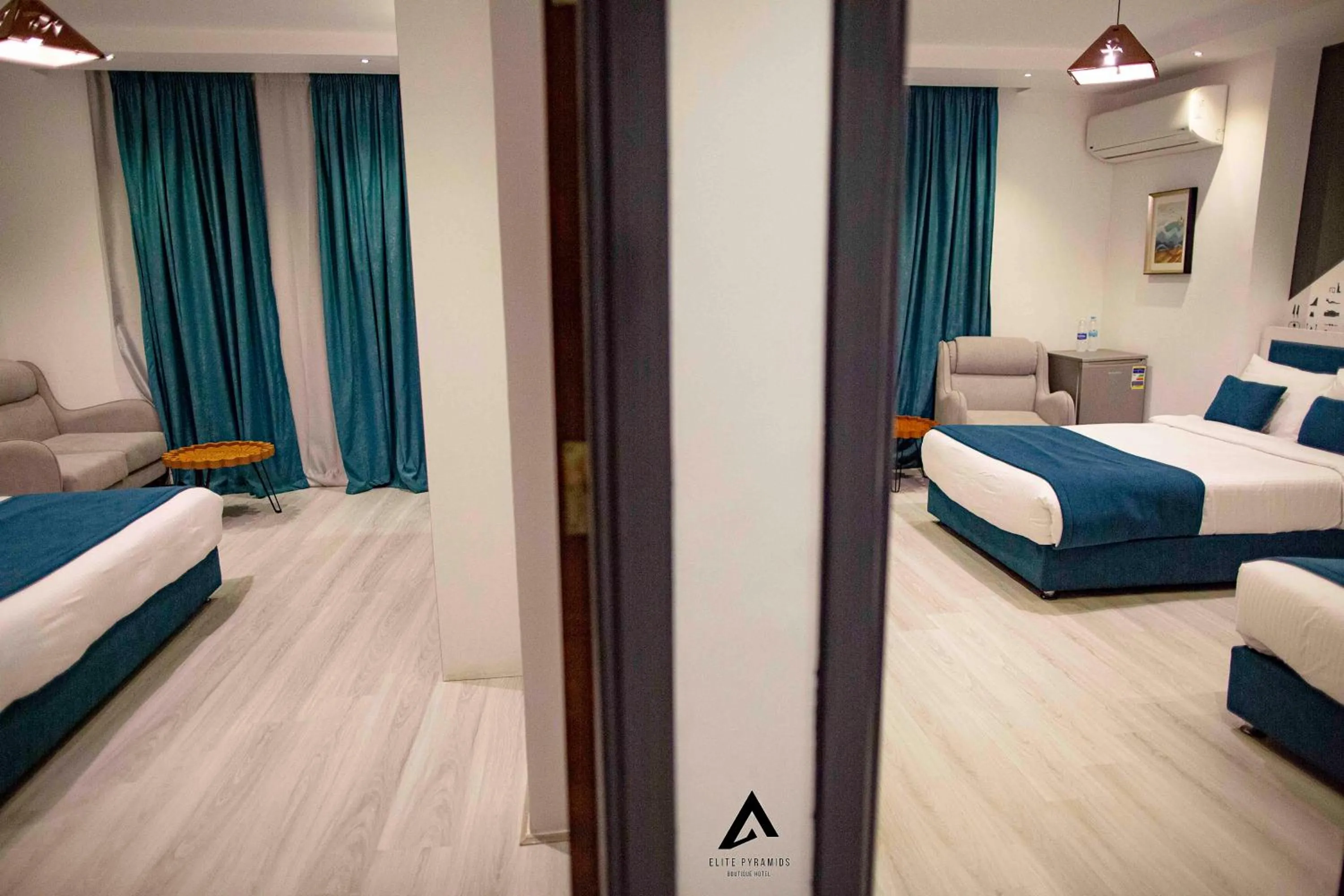 Bed in Elite Pyramids Boutique Hotel