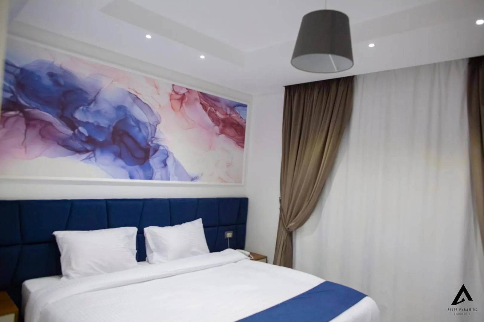 Bed in Elite Pyramids Boutique Hotel