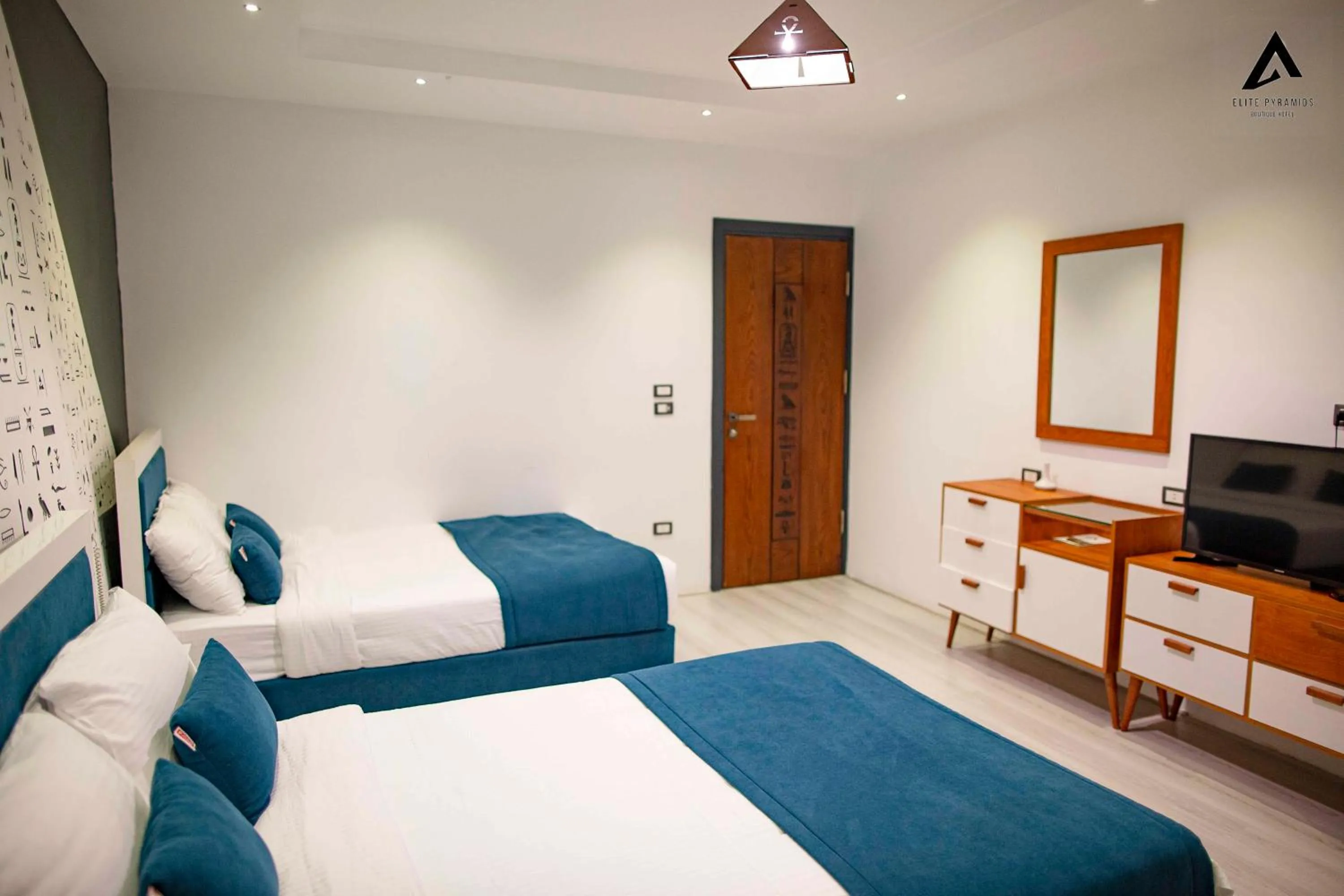 Bed in Elite Pyramids Boutique Hotel