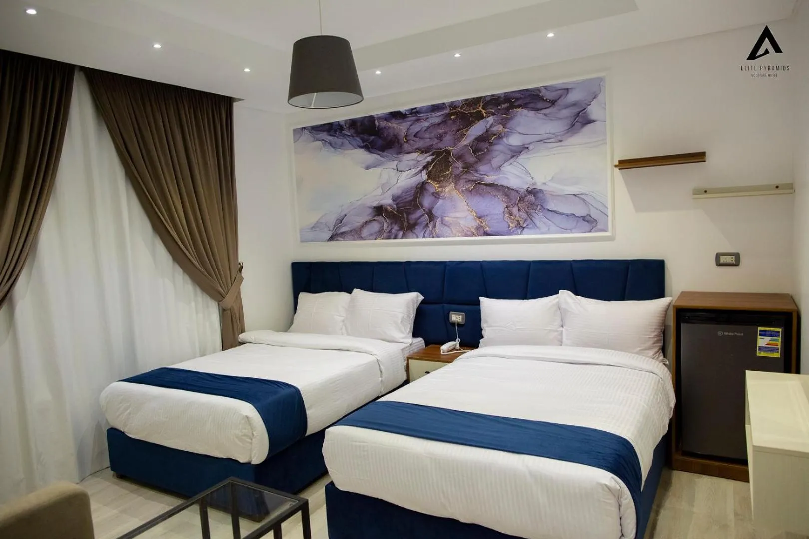 Bed in Elite Pyramids Boutique Hotel