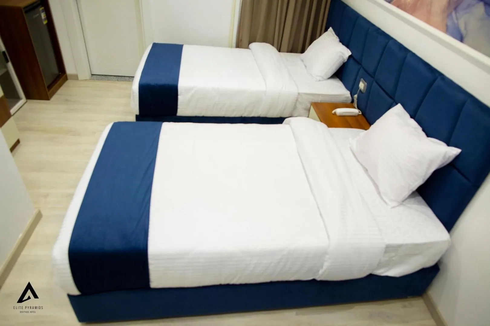 Bed in Elite Pyramids Boutique Hotel