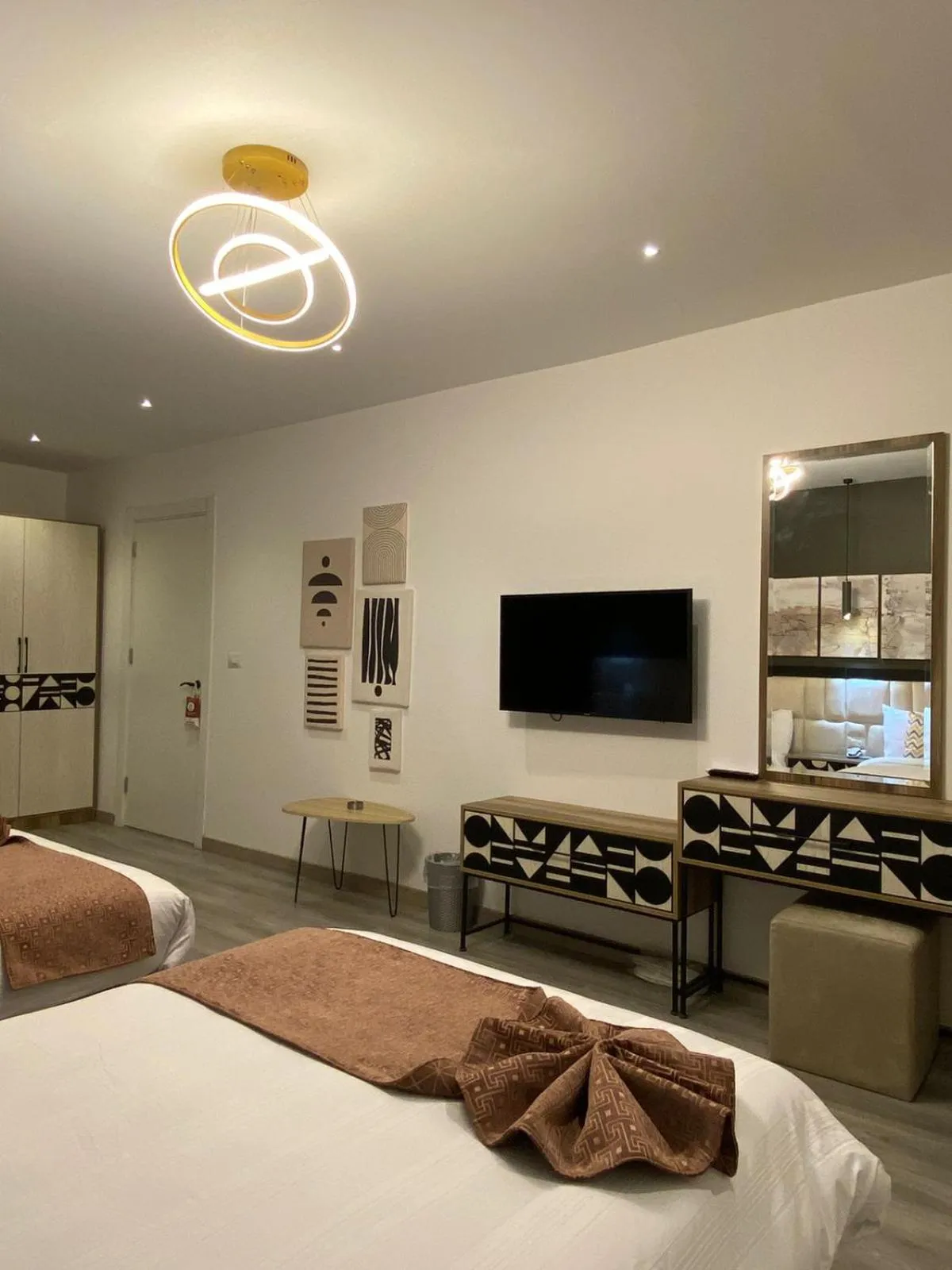 Communal lounge/ TV room, Bed in Elite Pyramids Boutique Hotel