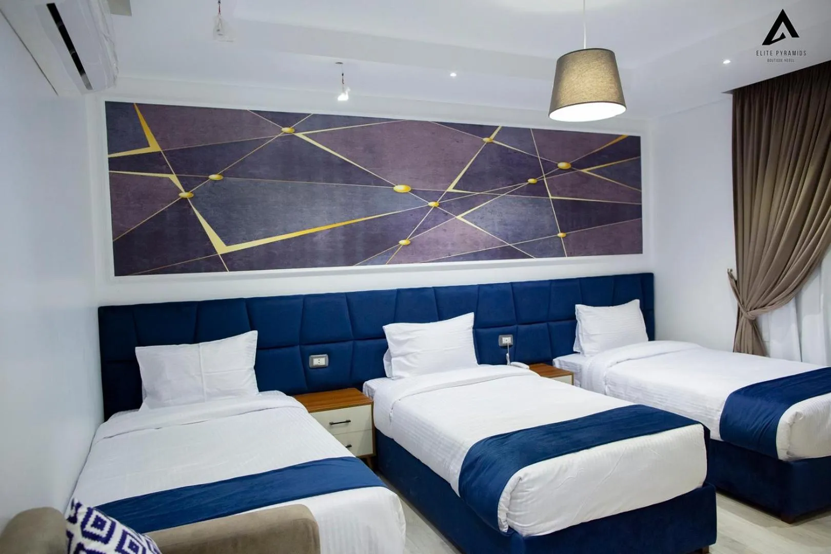 Bed in Elite Pyramids Boutique Hotel