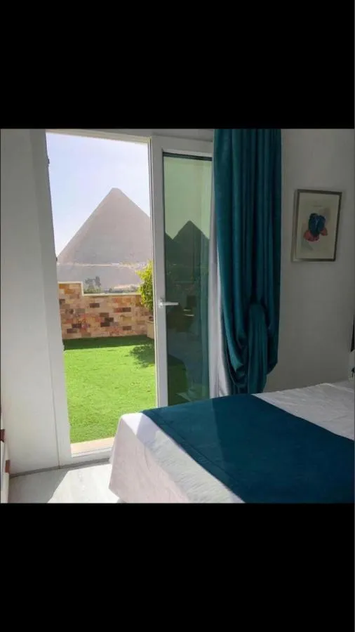 Bed in Elite Pyramids Boutique Hotel