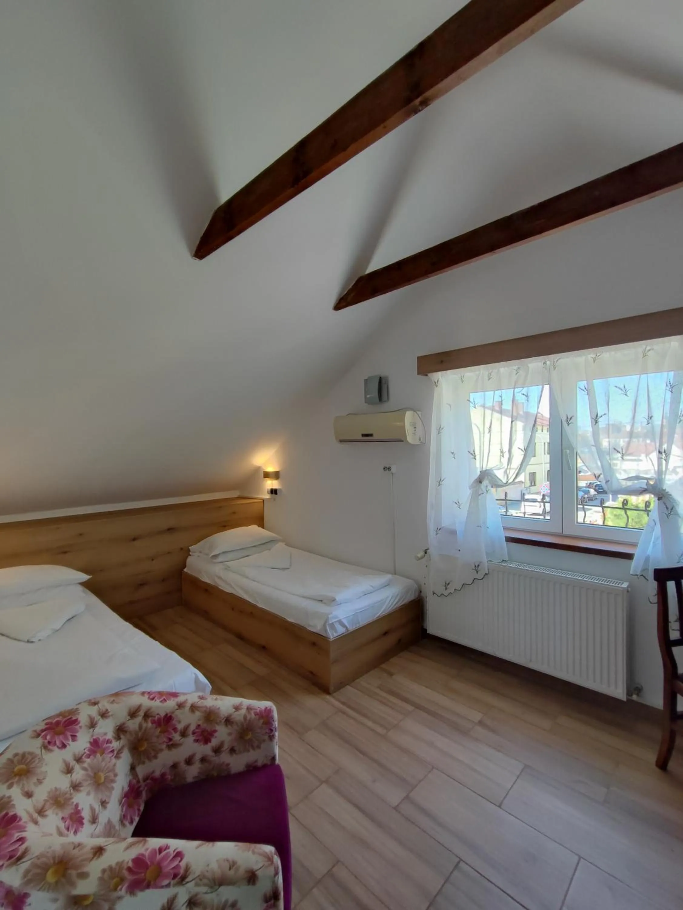 Bed in Pensiunea Buon Gusto Sibiu-motorcyle friendly,city center