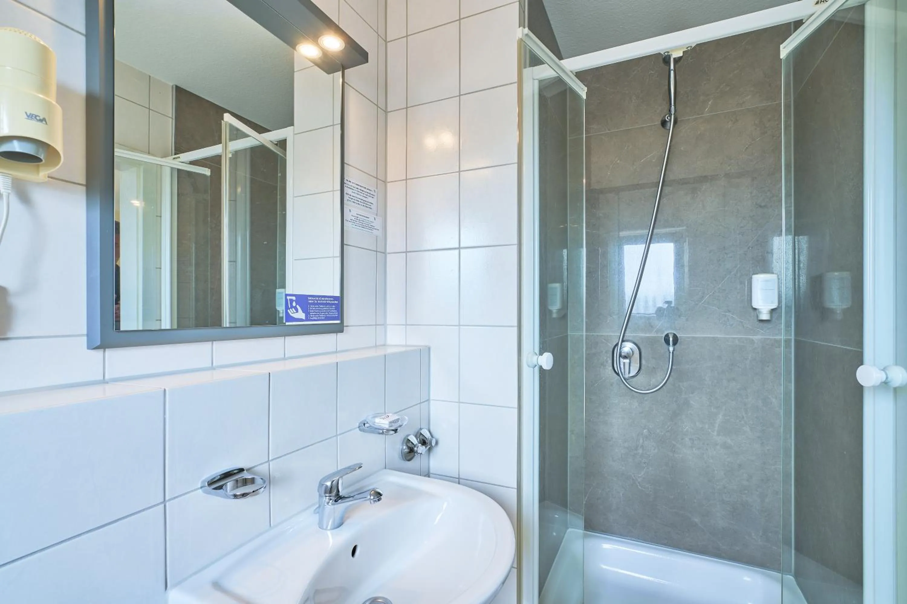 Bathroom in eXo Individual Hotel Waghäuseler Hof