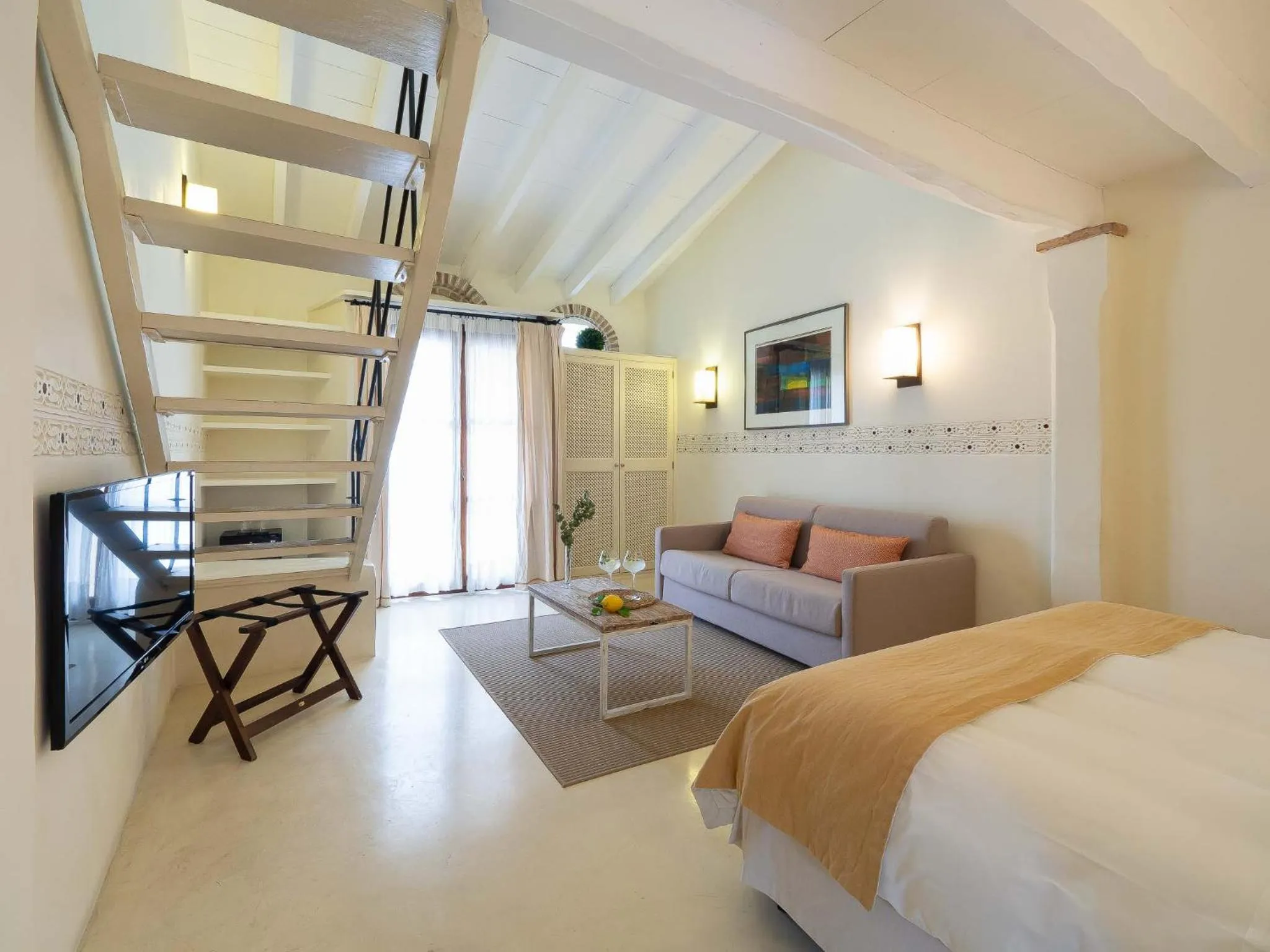 Living room, Bed in Hotel & Restaurant Jardi d'Artà