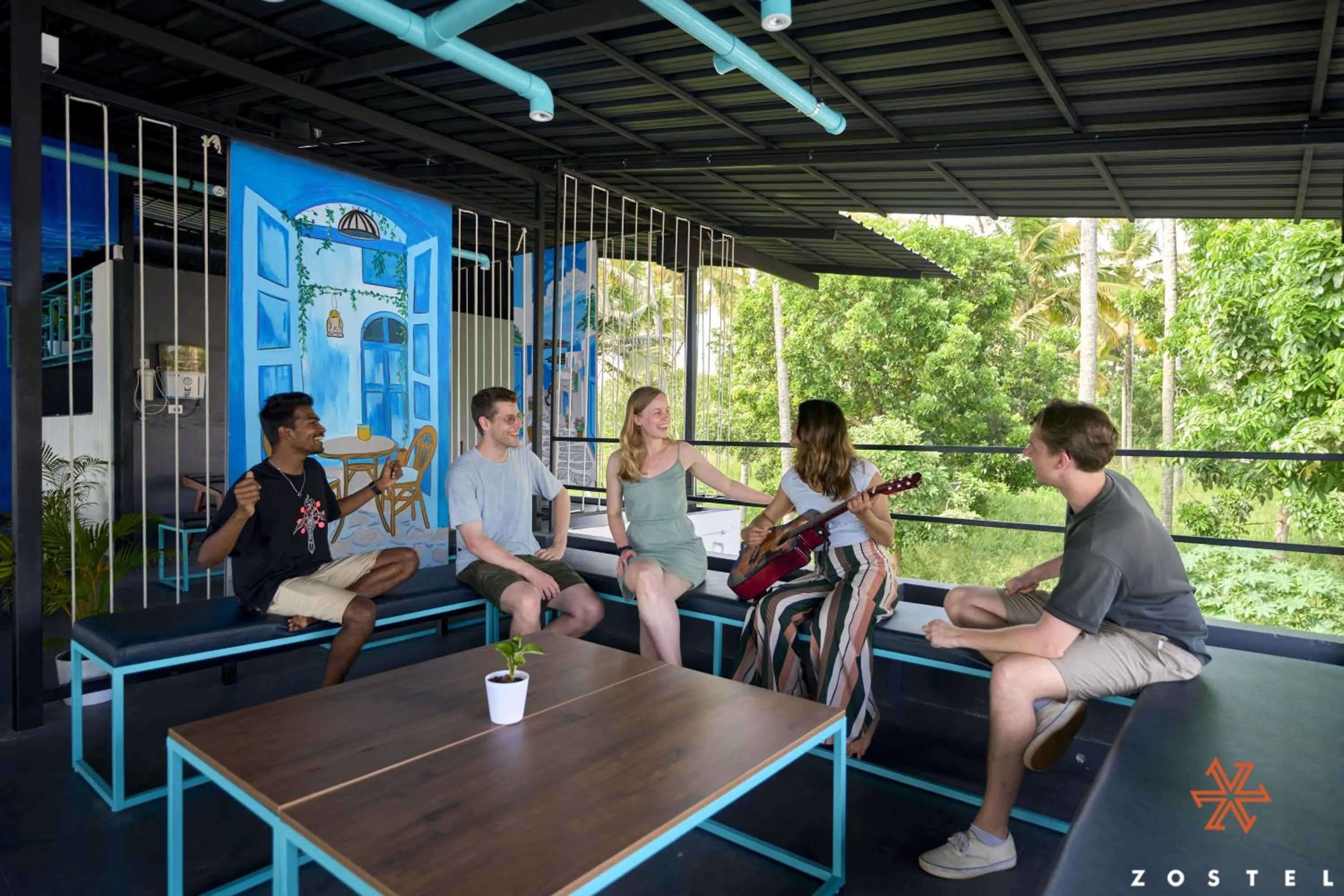 Communal lounge/ TV room in Zostel Varkala