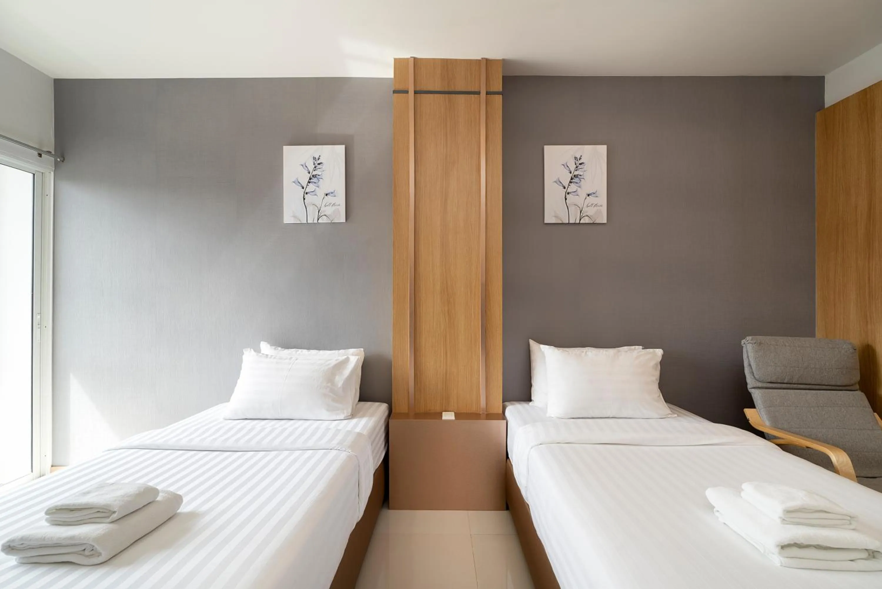 Bed in Riski Residence Ngamwongwan